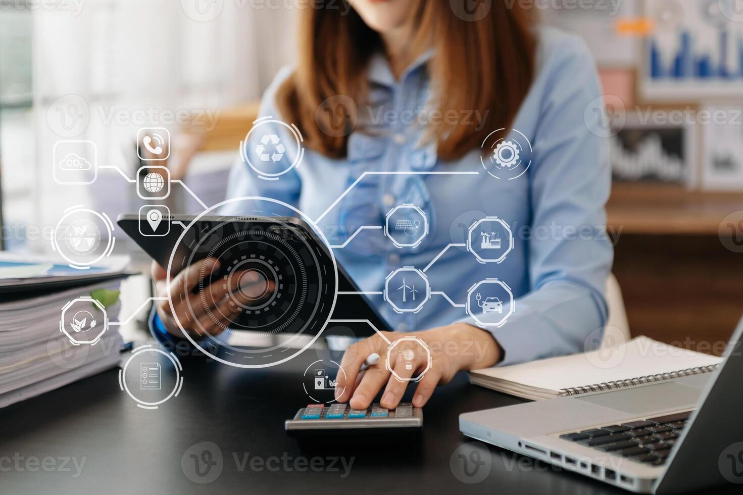 Business team working virtual modern smartphone to reduce CO2 emissions carbon footprint climate change to limit global warming.Sustainable development and green business concept. at office photo
