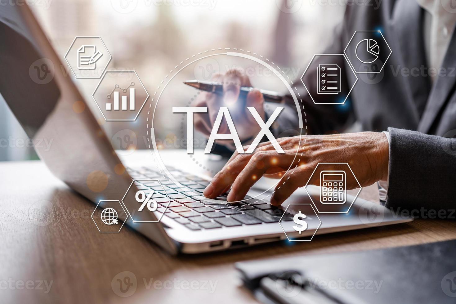 Stressed young businessman using laptop for checking bills, taxes, bank account balance and calculating and accounting analyze financial report, Tax payment concept photo