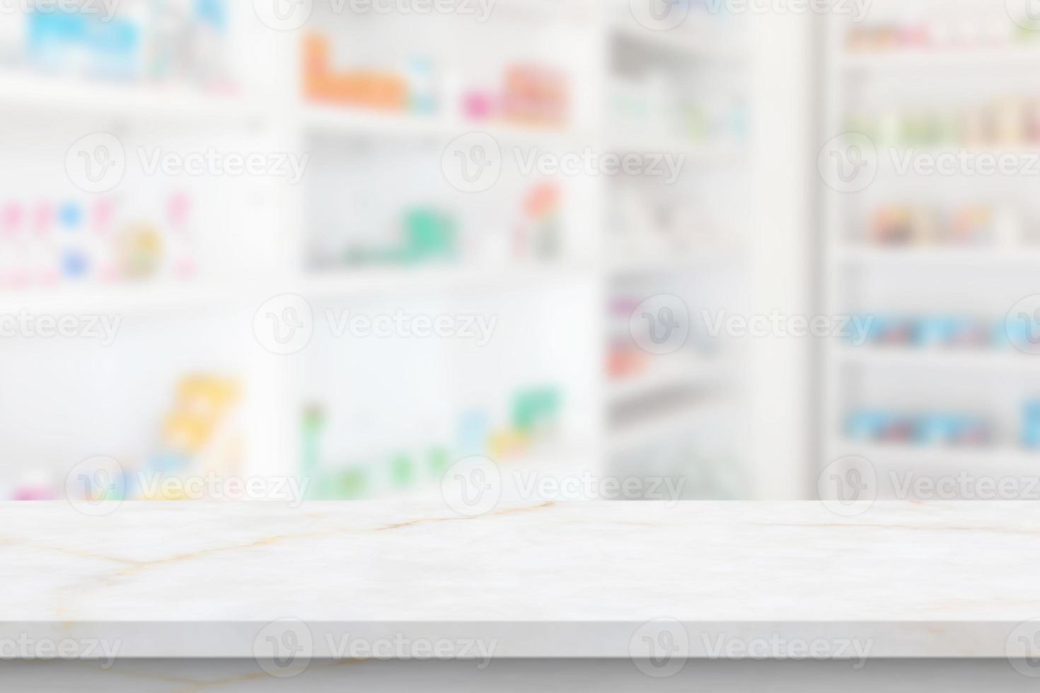 Empty white marble counter top with blur pharmacy drugstore shelves background photo