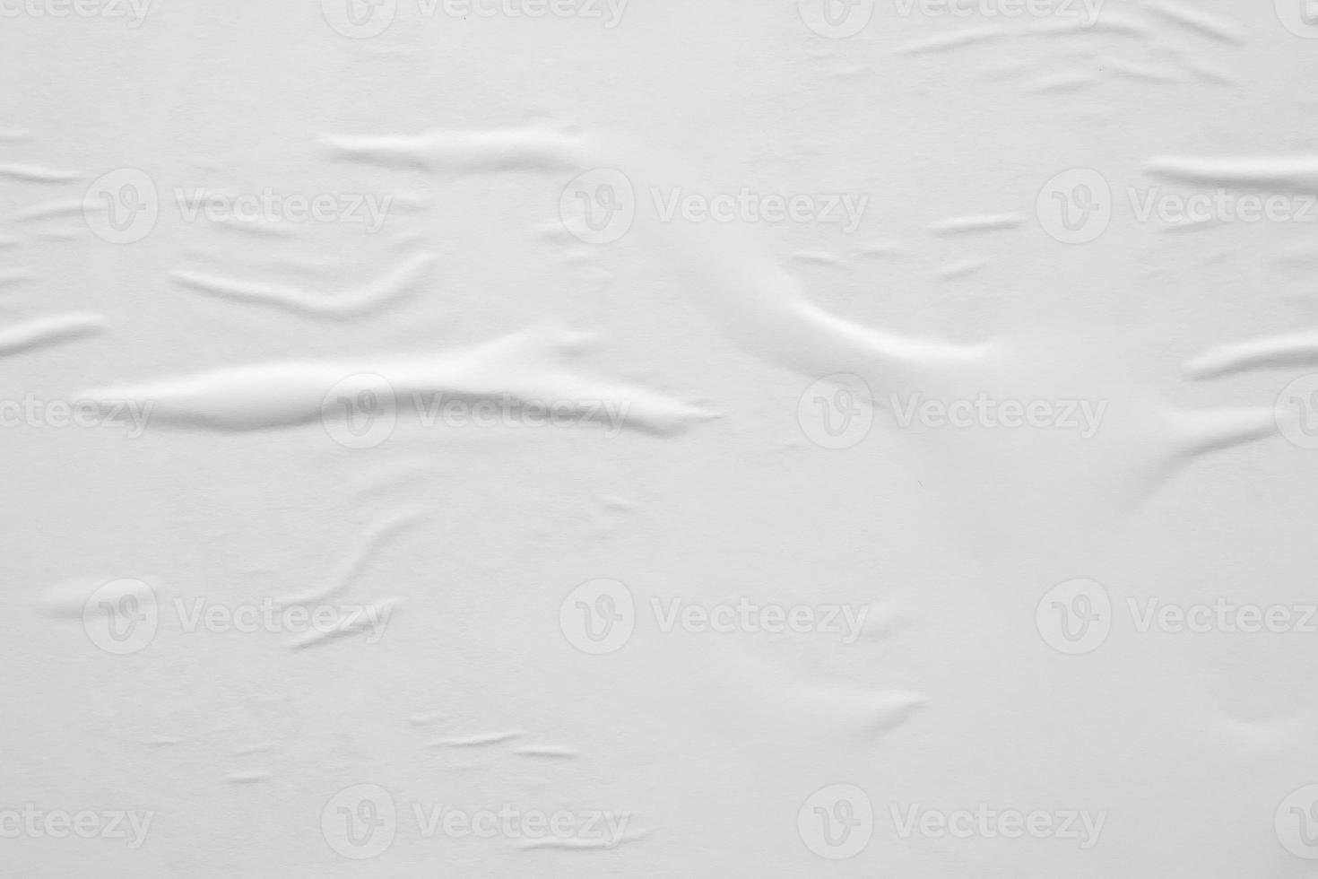 white crumpled and creased paper poster texture background photo