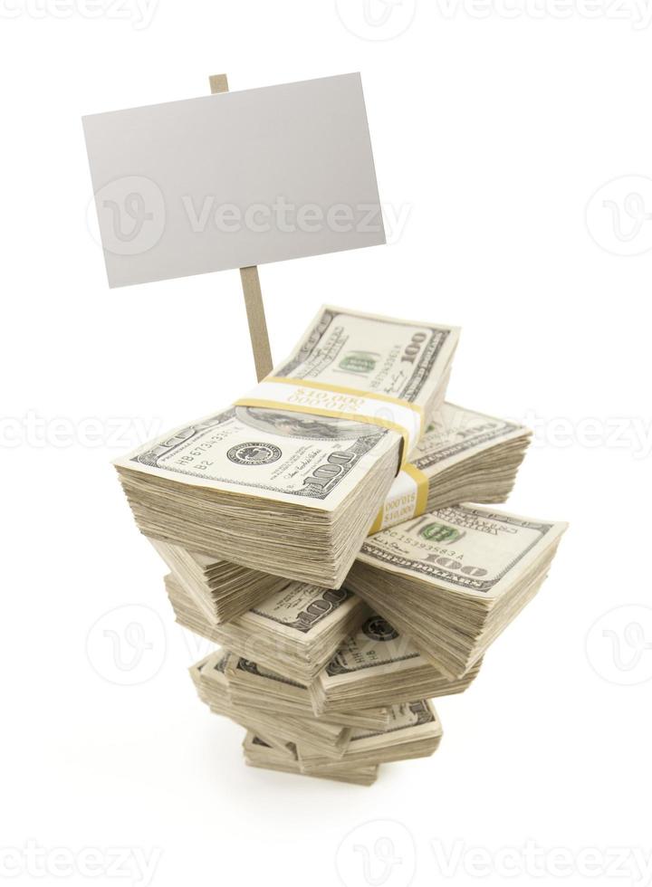 Stacks of One Hundred Dollar Bills with Blank Sign photo