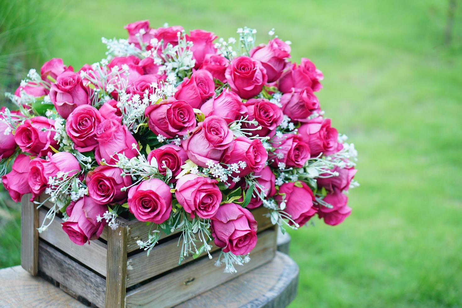 Beautiful colorful roses on the table for the festive New Year 2023 photo