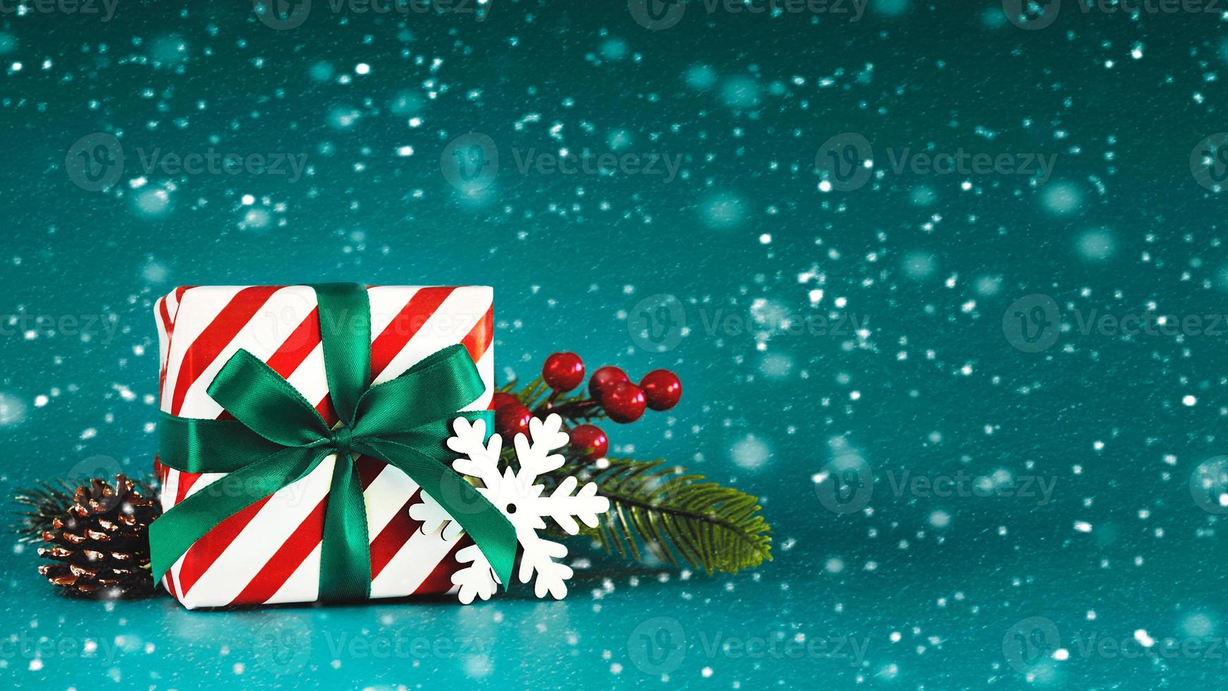 Christmas concept background. Christmas gift,christmas ornament and snowflakes with space for text photo