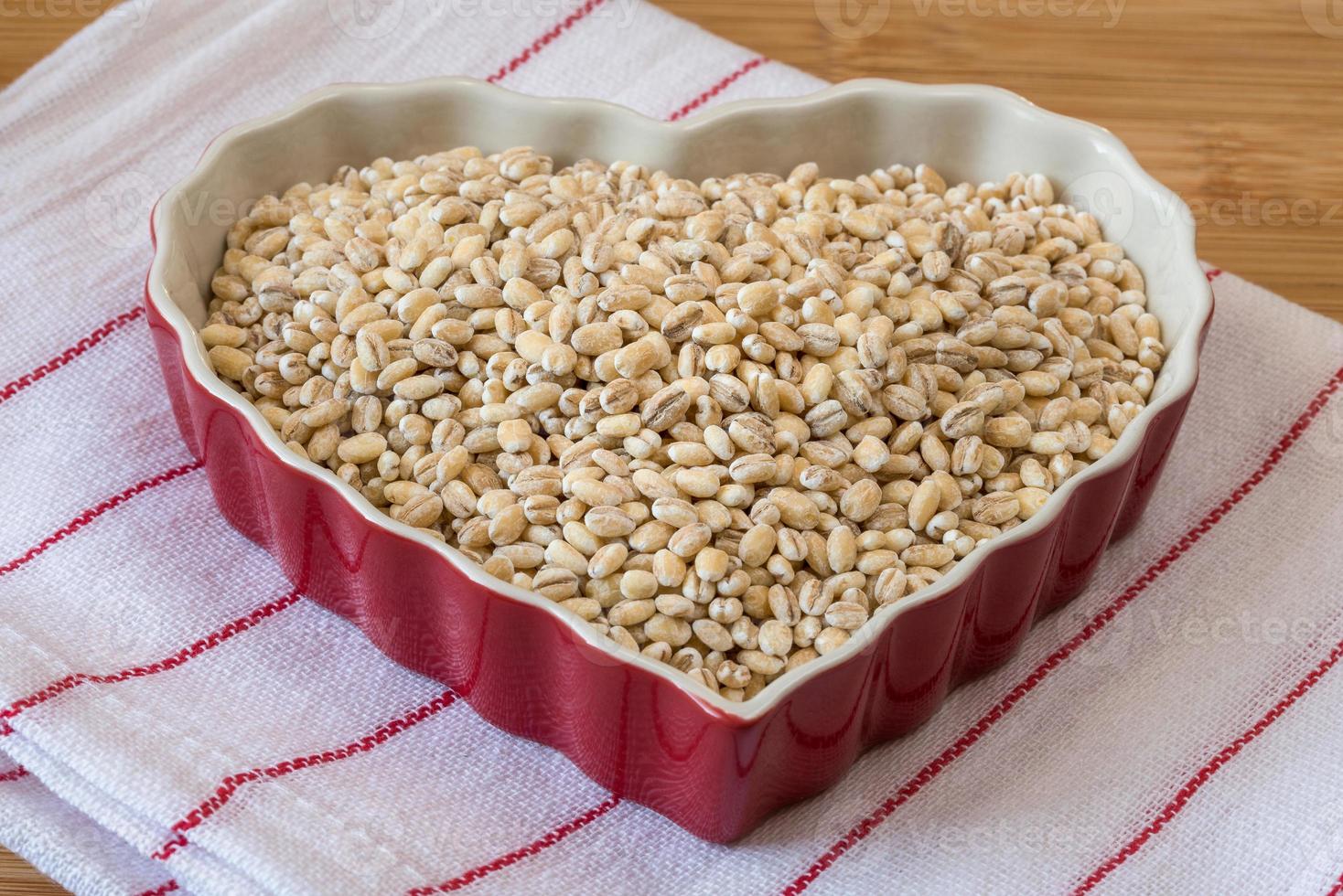 Uncooked Pearled Barley in a Bowl photo