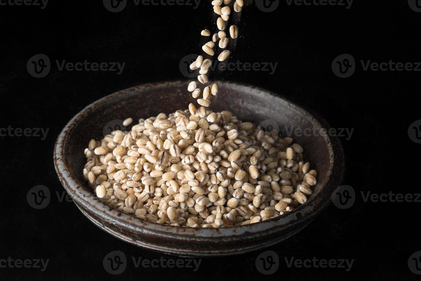Uncooked Pearled Barley in a Bowl photo