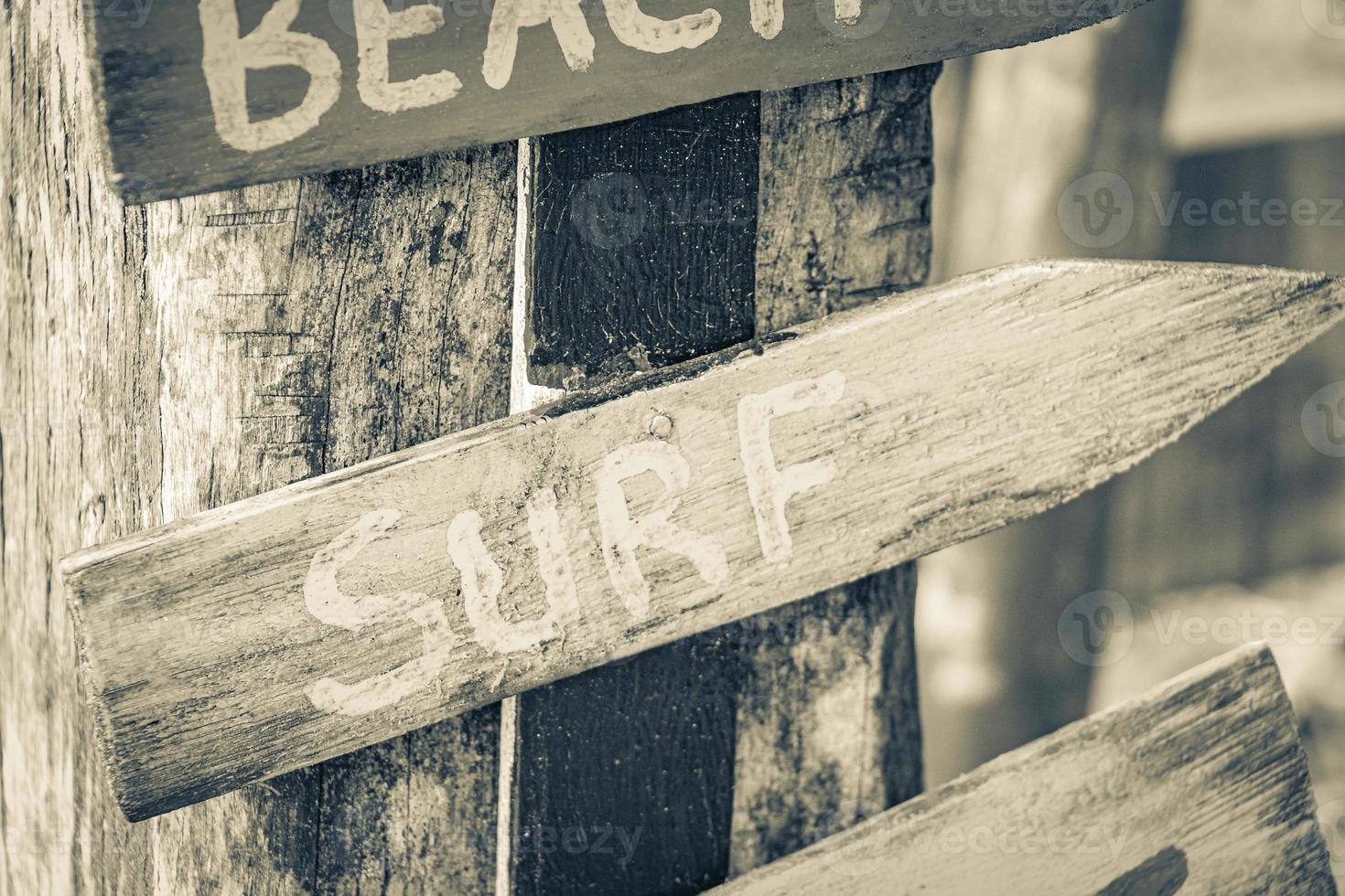 Sand beach surf relax colorful directional arrows Ilha Grande Brazil. photo