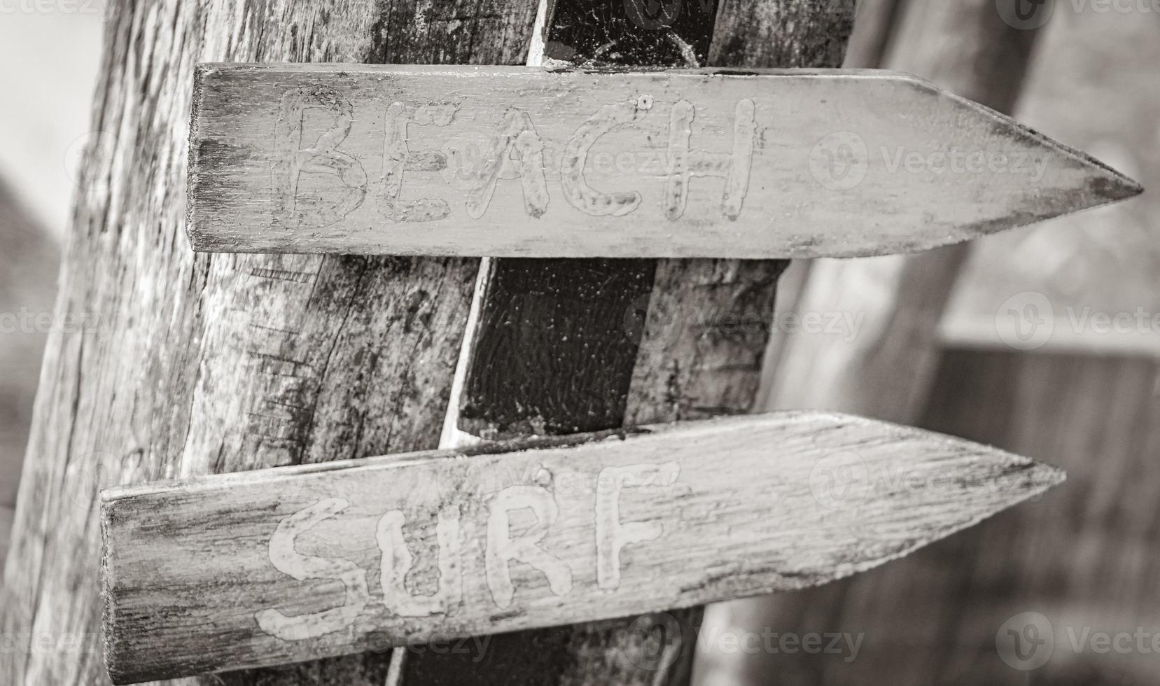 Sand beach surf relax colorful directional arrows Ilha Grande Brazil. photo