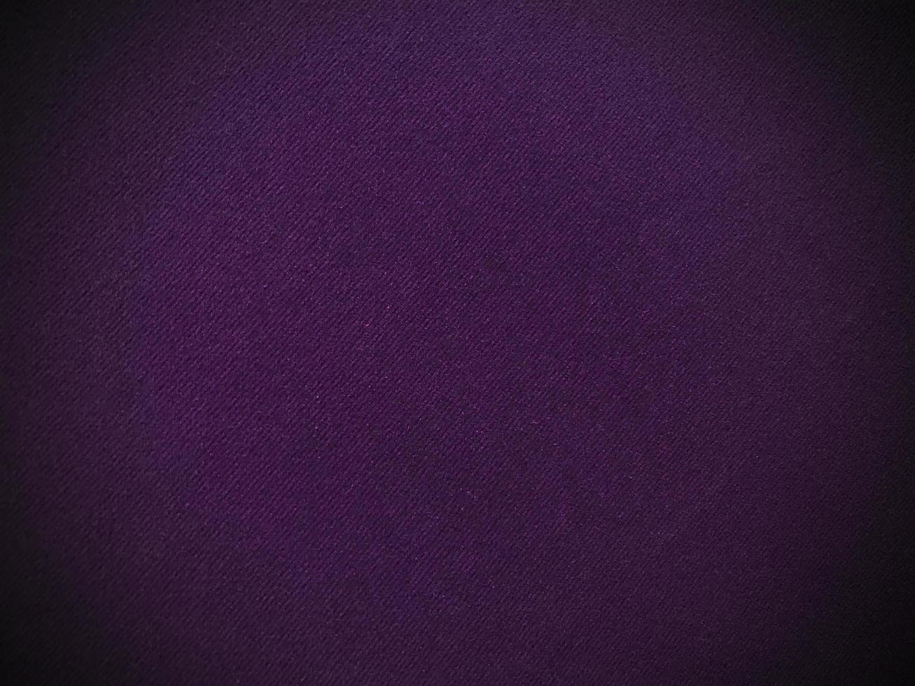 Dark purple old velvet fabric texture used as background. Empty purple fabric background of soft and smooth textile material. There is space for text... photo