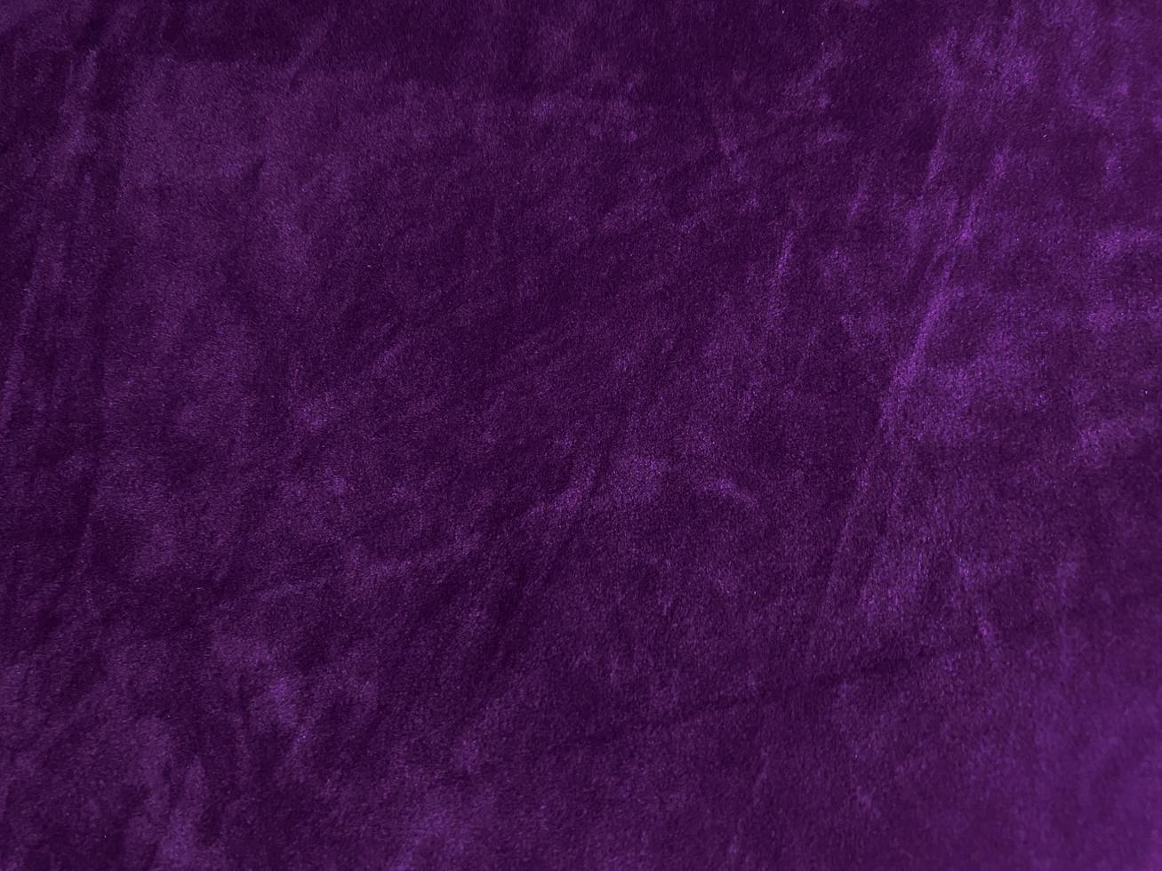 Purple velvet fabric texture used as background. Empty purple fabric background of soft and smooth textile material. There is space for text. photo