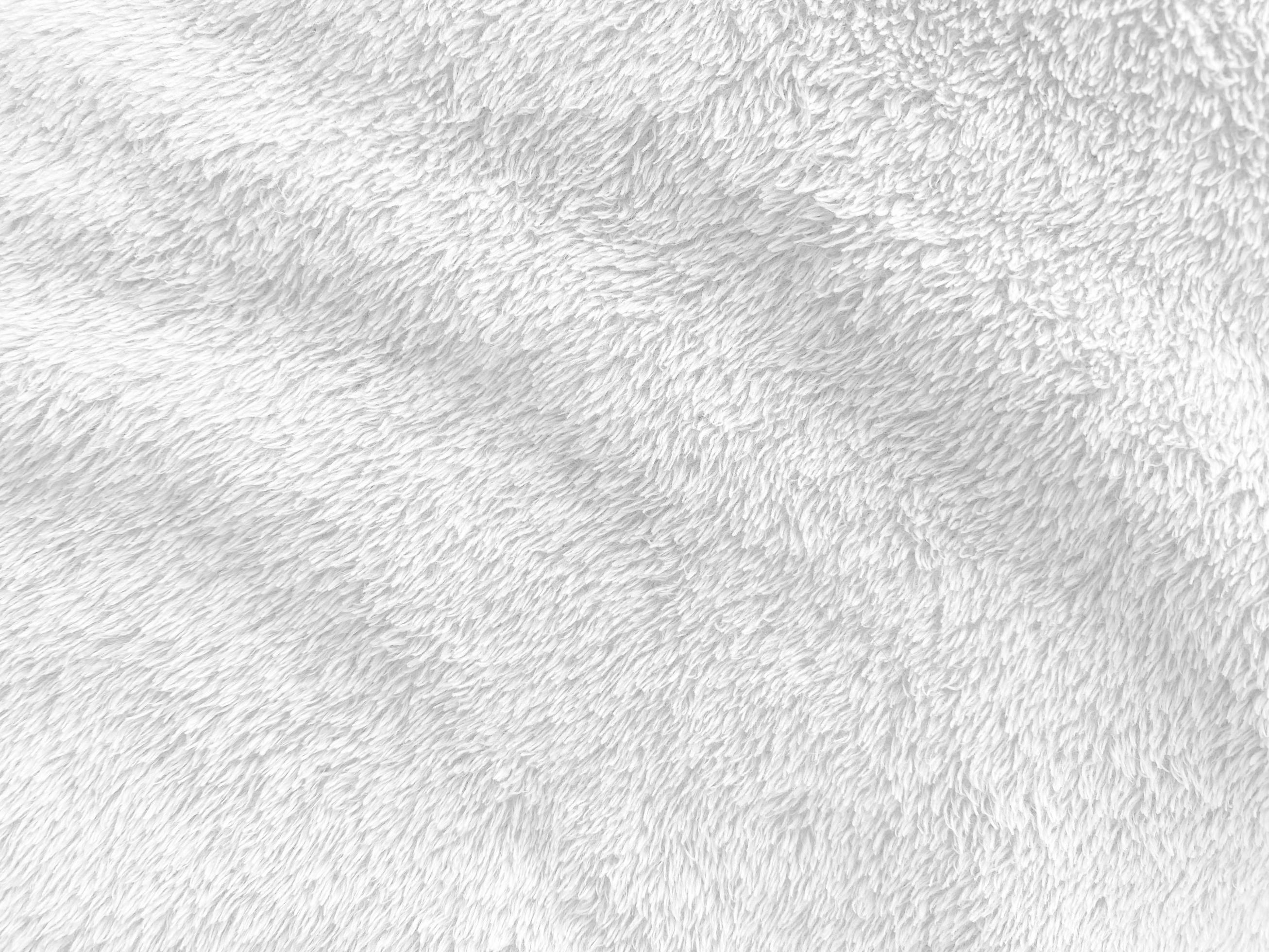 White clean wool texture background. light natural sheep wool. white