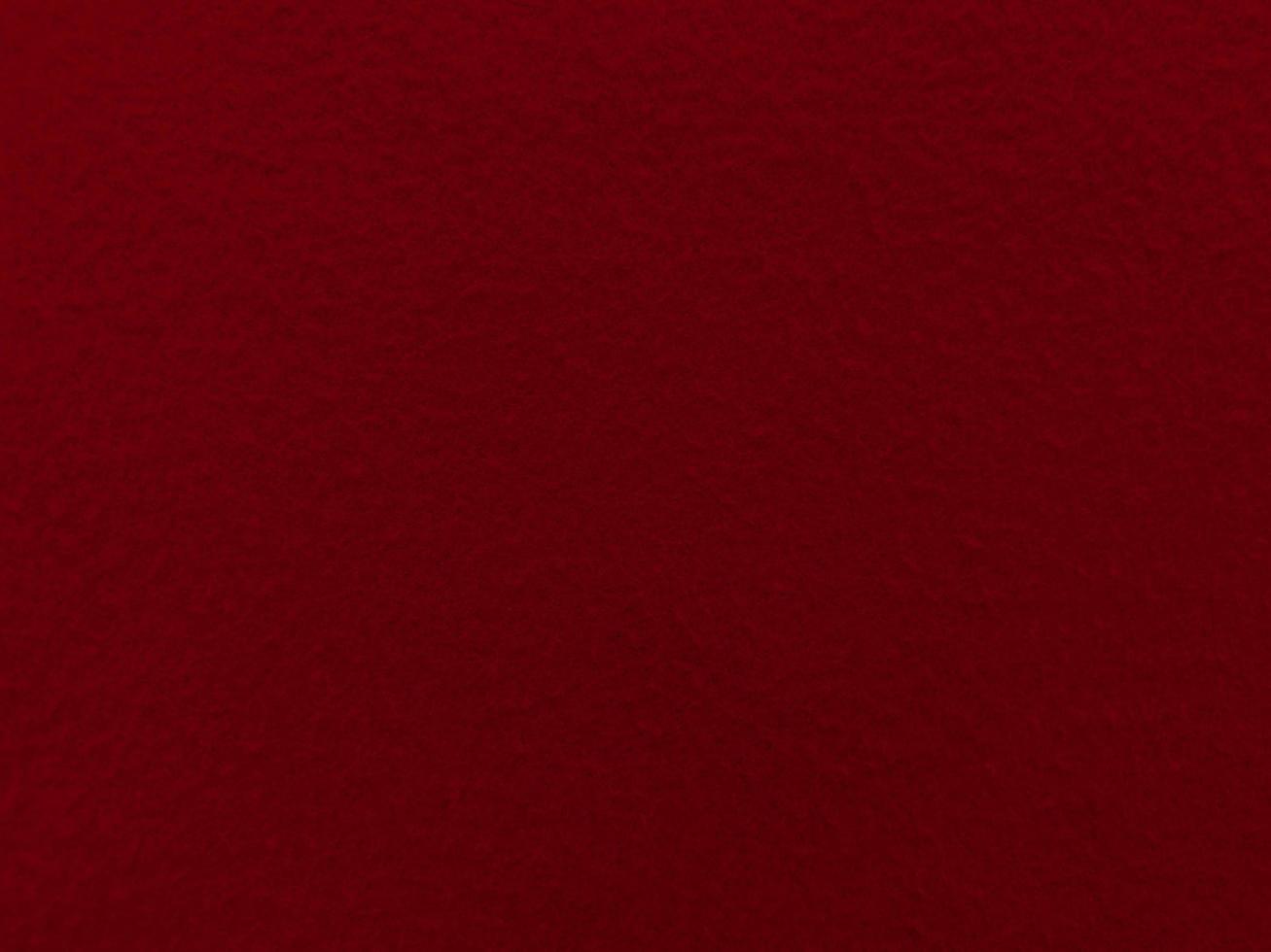 Felt red soft rough textile material background texture close up,poker table,tennis ball,table cloth. Empty red fabric background. photo