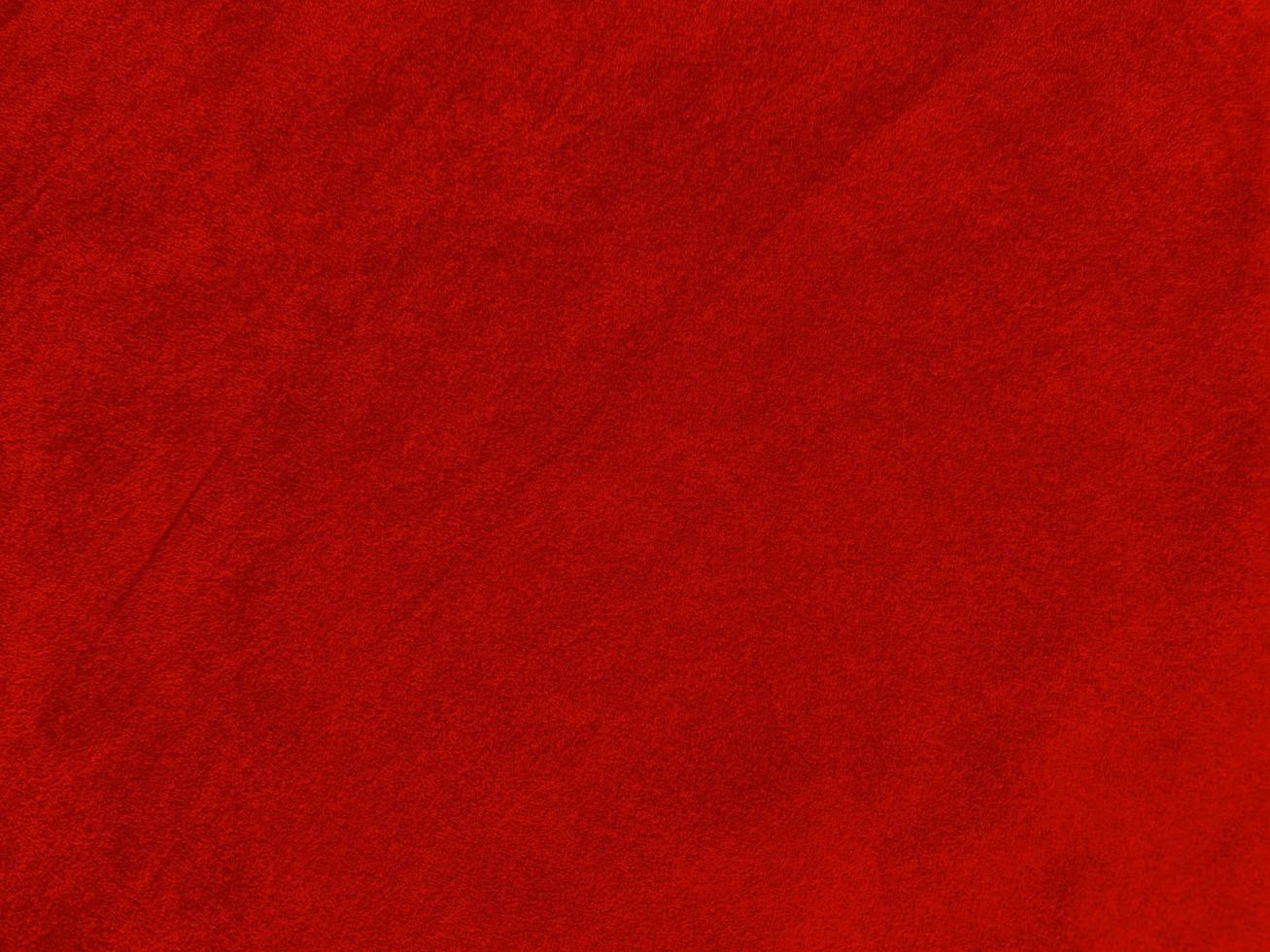 Dark red velvet fabric texture used as background. Empty dark red fabric background of soft and smooth textile material. There is space for text.. photo