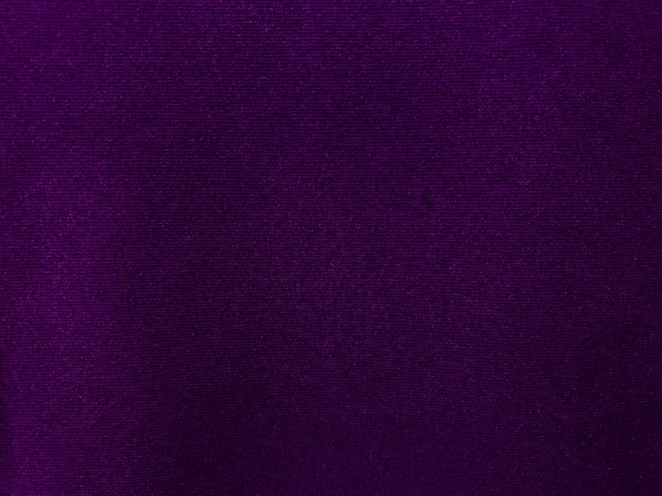 Purple velvet fabric texture used as background. Empty purple fabric background of soft and smooth textile material. There is space for text. photo