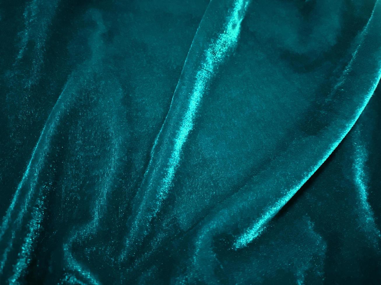 emerald green velvet fabric texture used as background. Empty emerald green fabric background of soft and smooth textile material. There is space for text. photo
