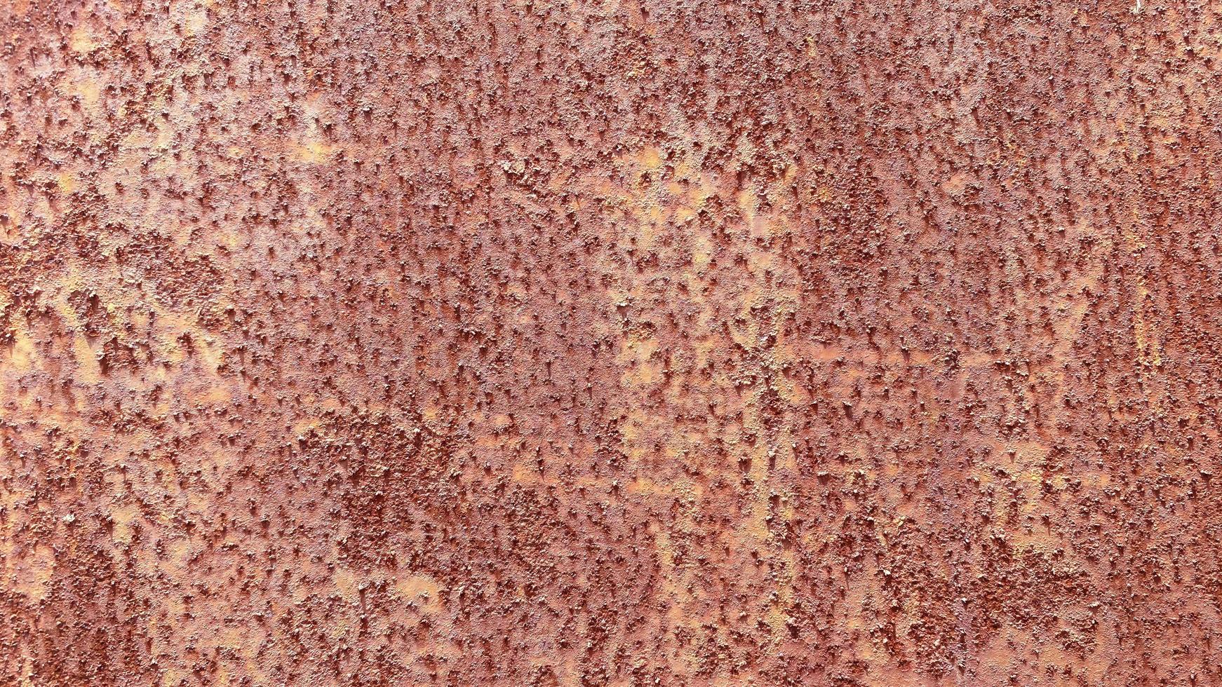 Seamless surface of rusted steel It has a rough, brown texture suitable for making a background. And vintage wallpapers have a space for writing messages. photo