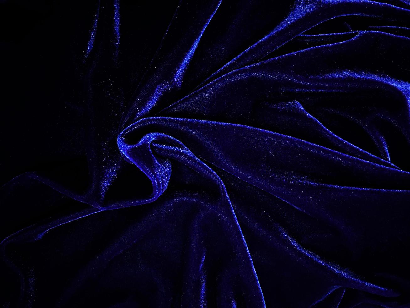 Blue velvet fabric texture used as background. Empty blue fabric background of soft and smooth textile material. There is space for text. photo