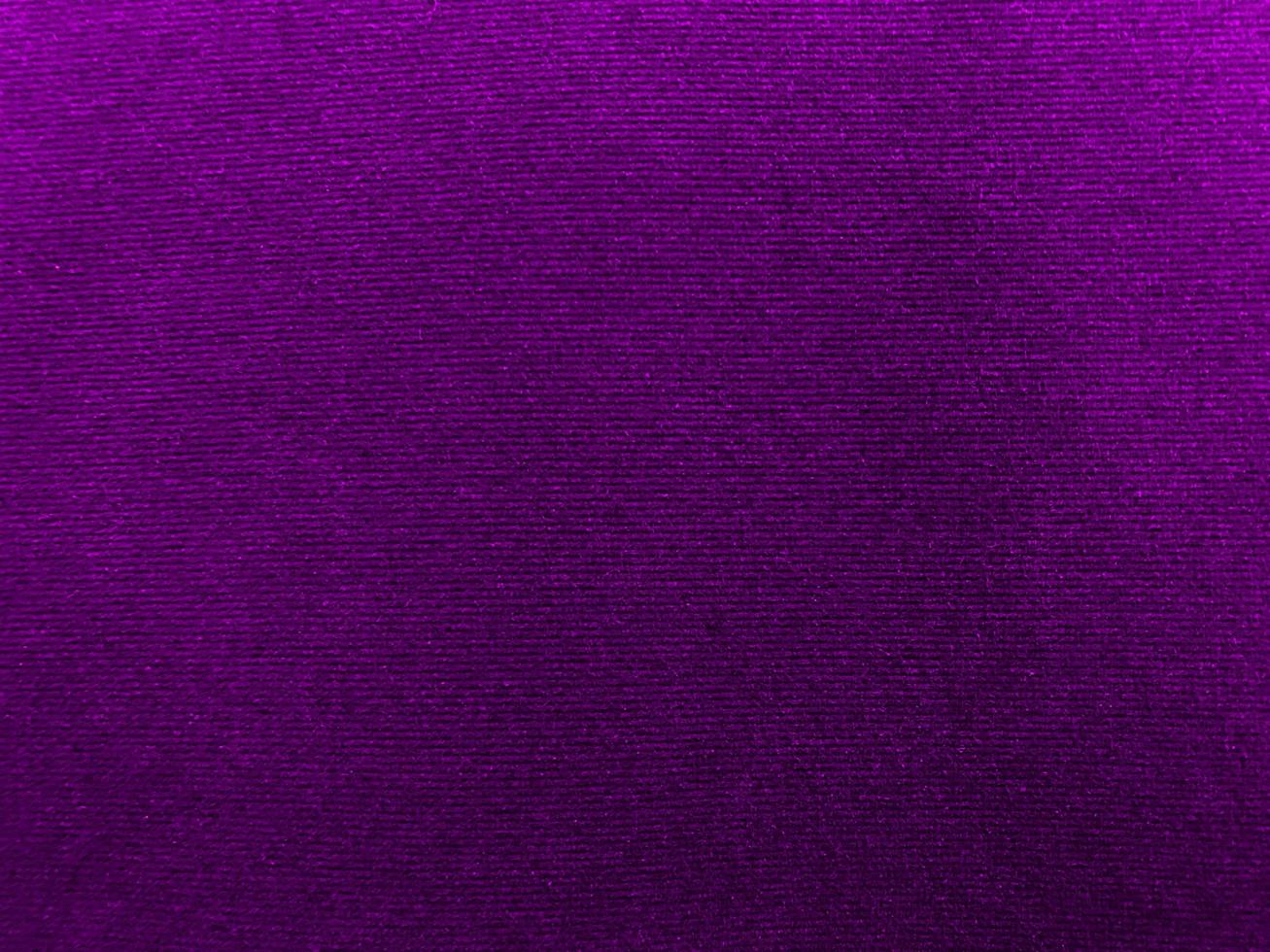 Dark purple velvet fabric texture used as background. Empty purple fabric background of soft and smooth textile material. There is space for text. photo