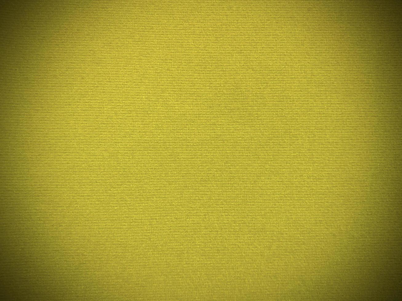 yellow velvet fabric texture used as background. Empty yellow fabric background of soft and smooth textile material. There is space for text.. photo