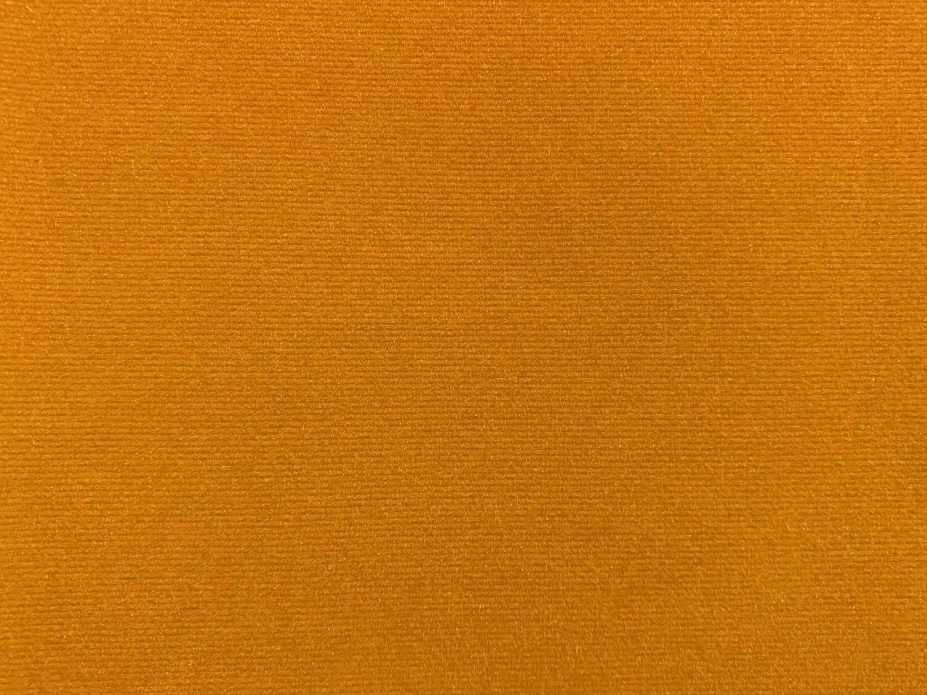 yellow velvet fabric texture used as background. Empty yellow fabric background of soft and smooth textile material. There is space for text.. photo