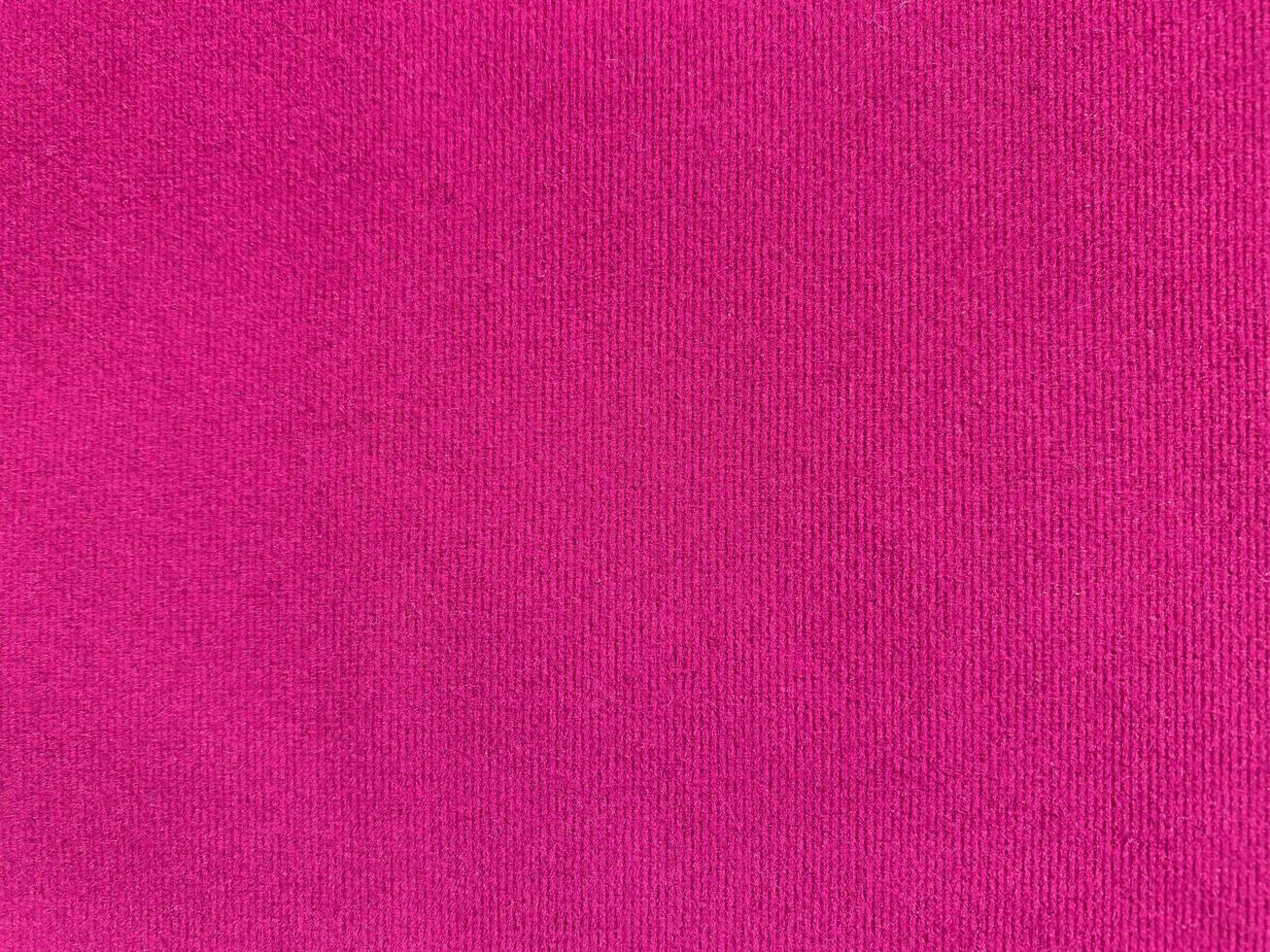 Pink velvet fabric texture used as background. Empty pink fabric background of soft and smooth textile material. There is space for text. photo