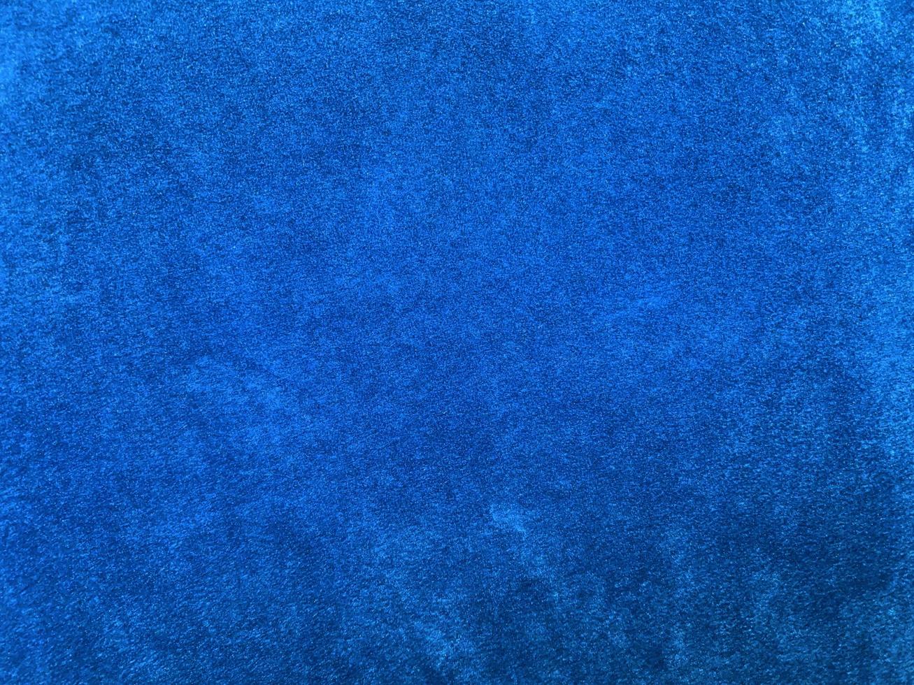 Light blue velvet fabric texture used as background. Empty light blue