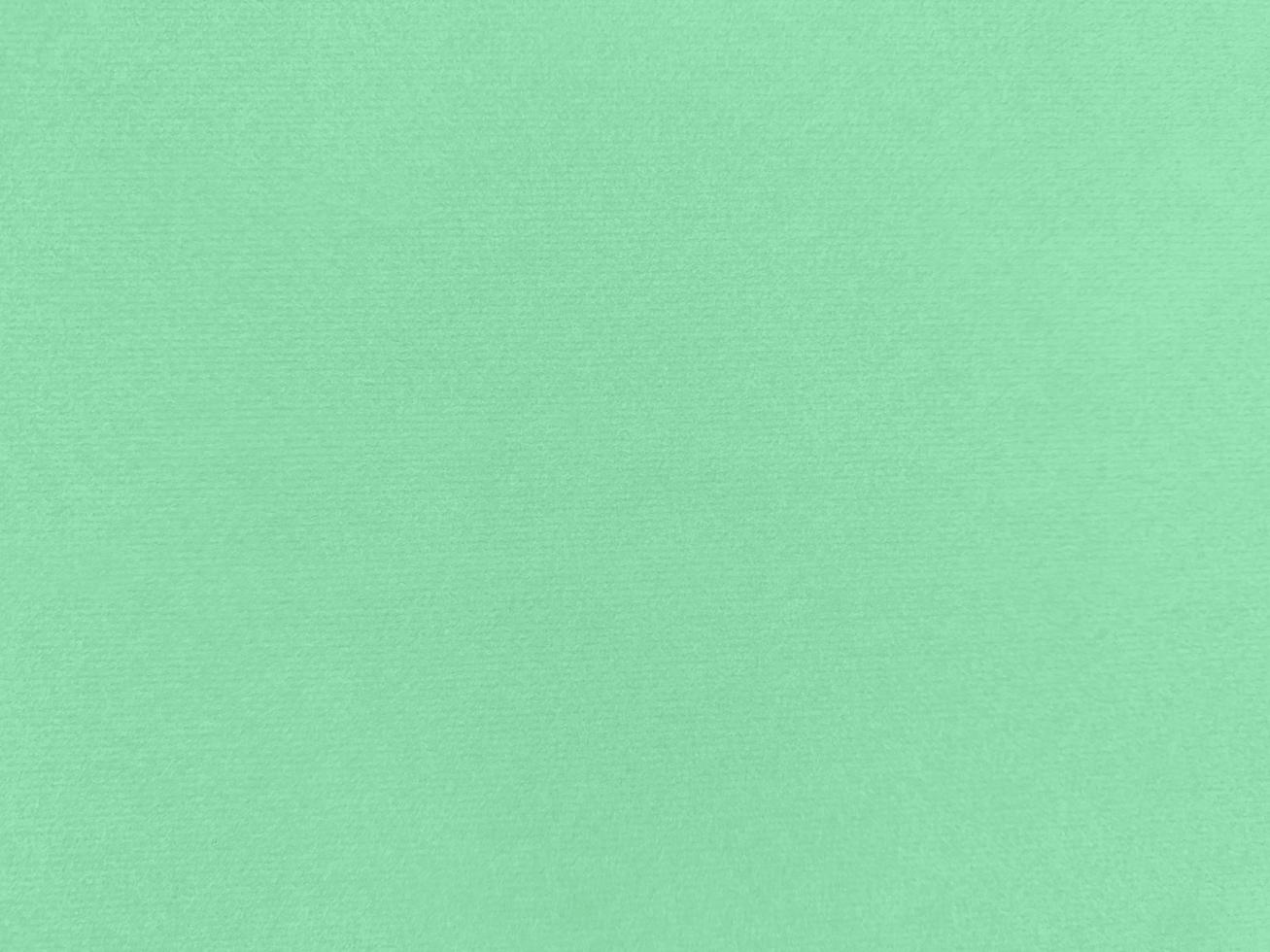 mint green velvet fabric texture used as background. Empty mint green fabric background of soft and smooth textile material. There is space for text. photo