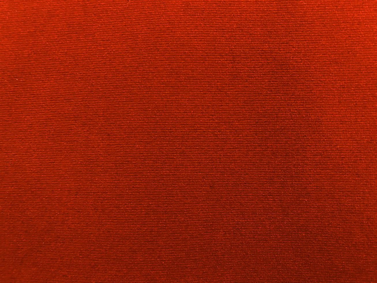 Red velvet fabric texture used as background. Empty red fabric background of soft and smooth textile material. There is space for text. photo