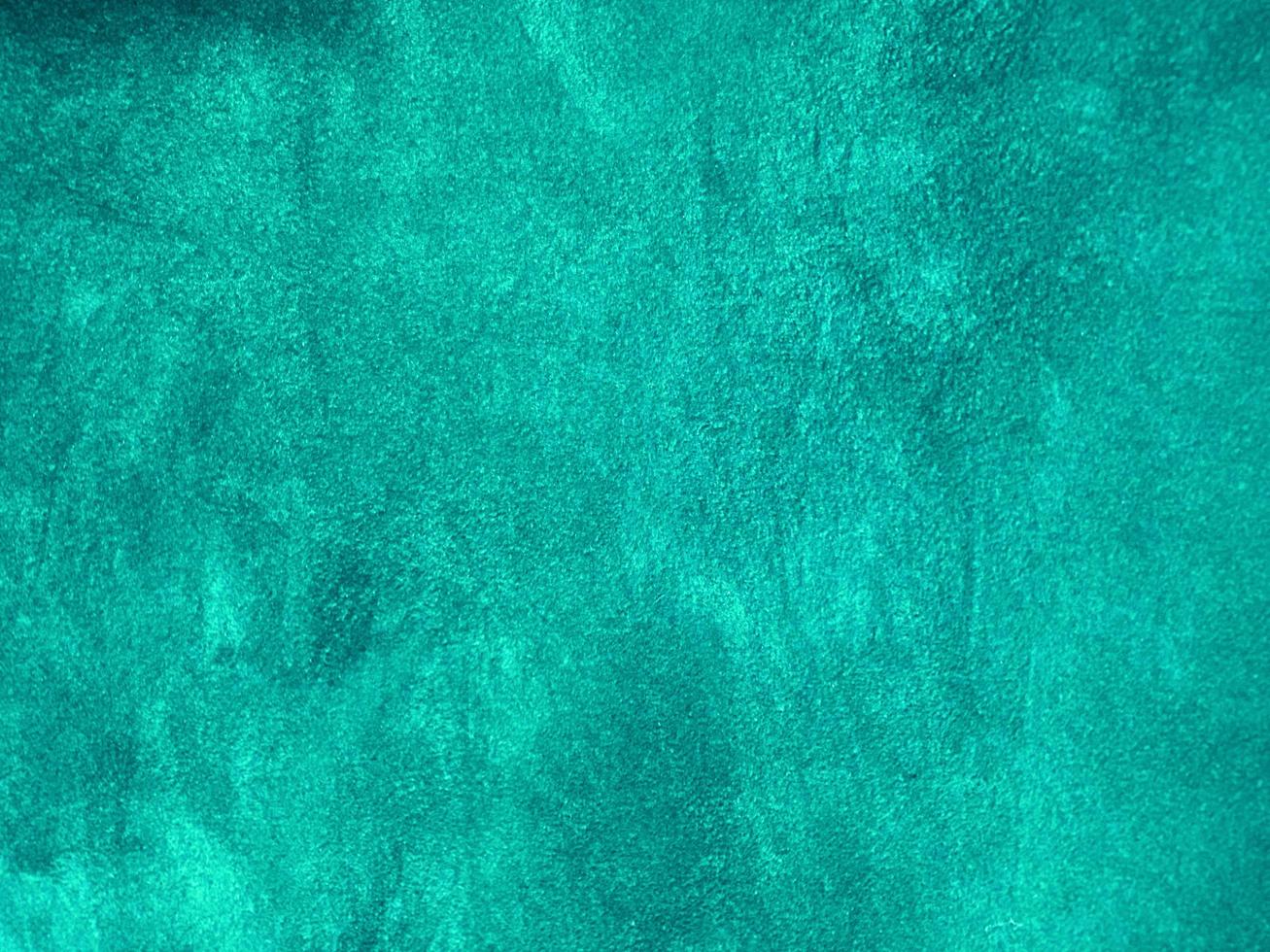 Dark green old velvet fabric texture used as background. Empty green fabric background of soft and smooth textile material. There is space for text. photo