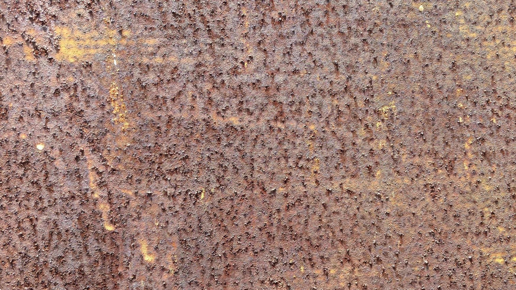 Seamless surface of rusted steel It has a rough, brown texture suitable for making a background. And vintage wallpapers have a space for writing messages. photo