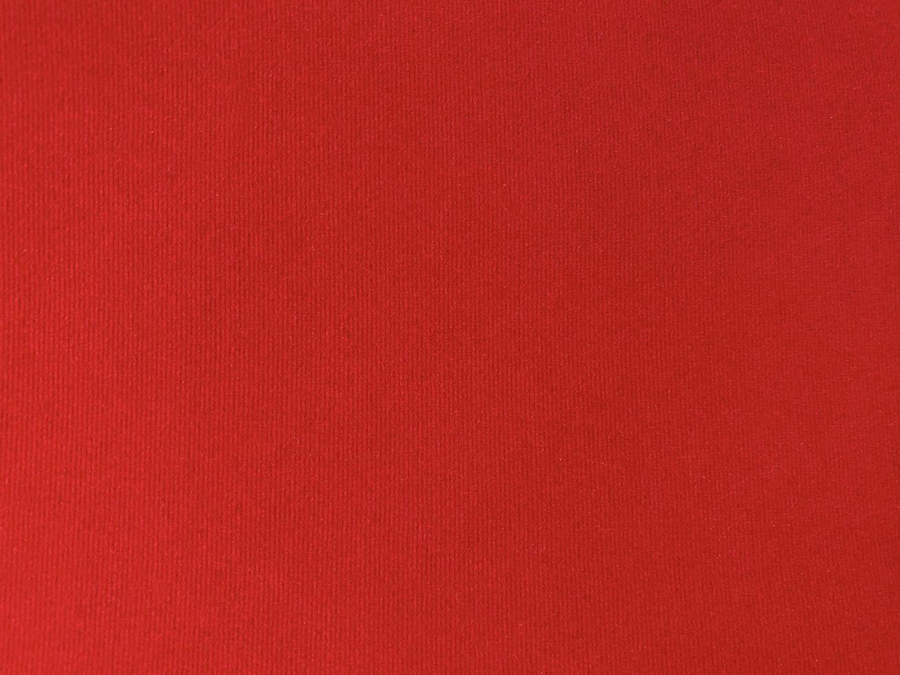 Red old velvet fabric texture used as background. Empty red fabric background of soft and smooth textile material. There is space for text.. photo