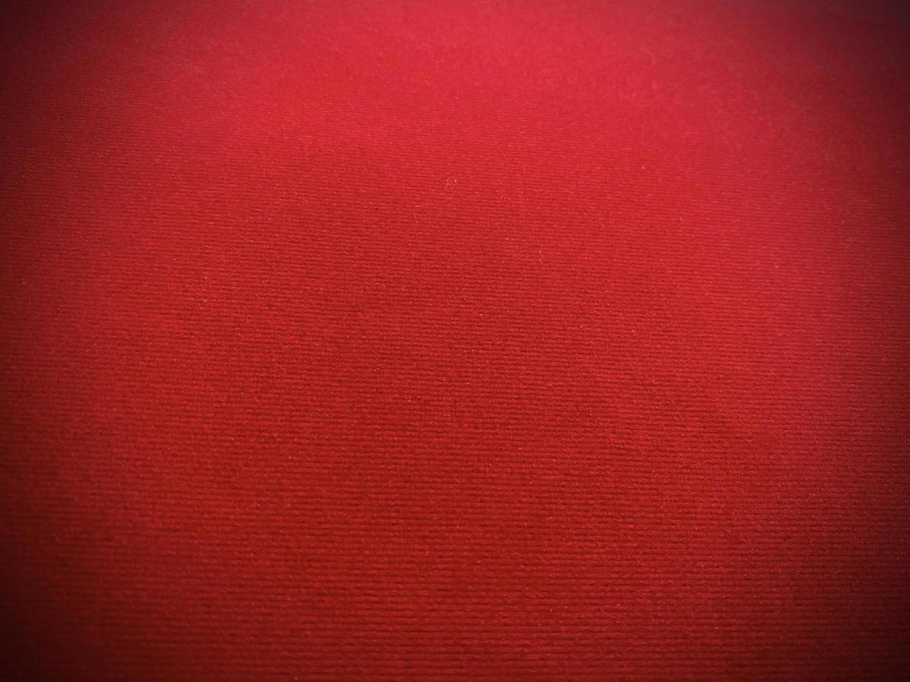 Red velvet fabric texture used as background. Empty red fabric background of soft and smooth textile material. There is space for text.. photo