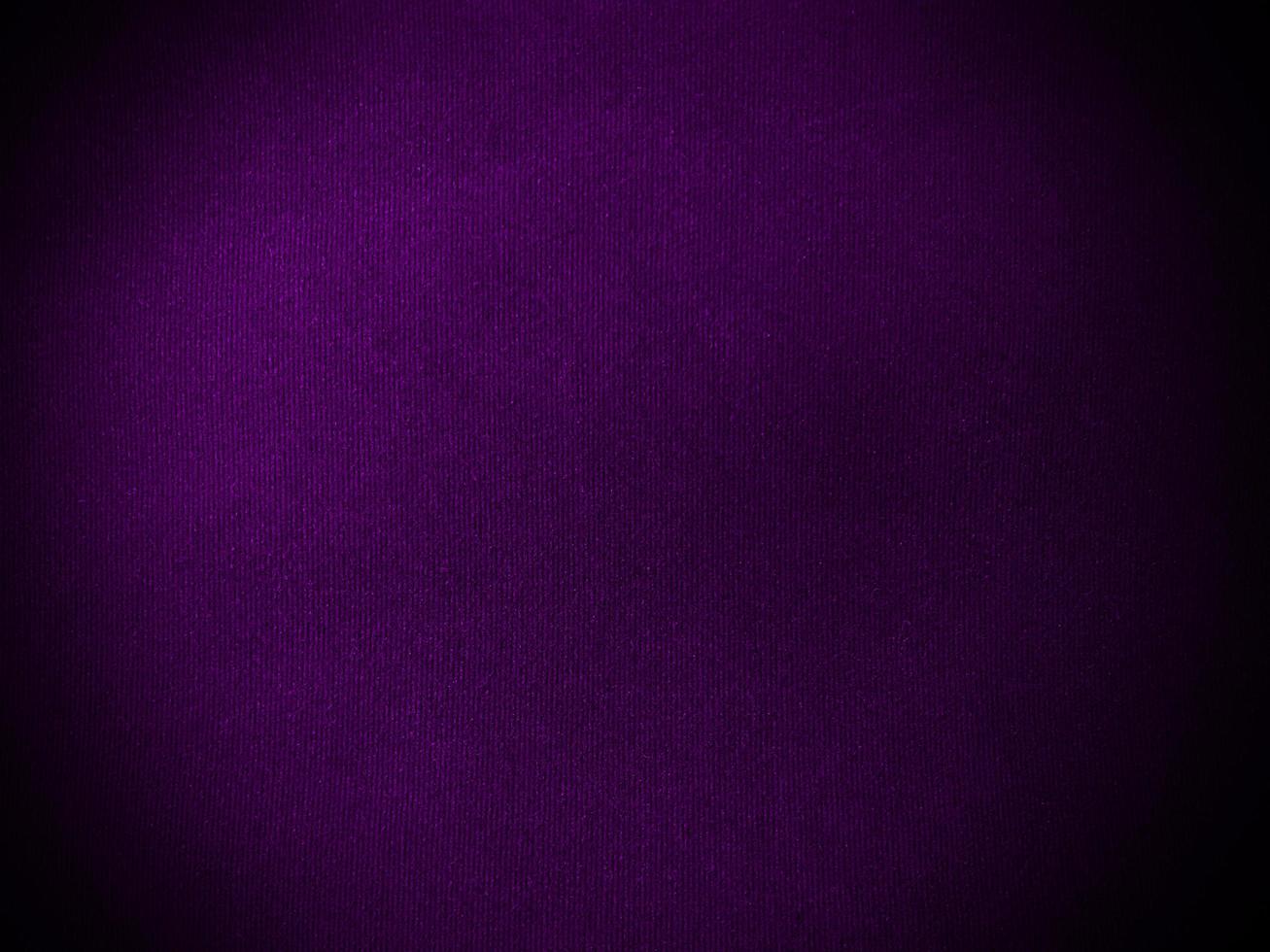 Dark purple velvet fabric texture used as background. Empty purple fabric background of soft and smooth textile material. There is space for text. photo