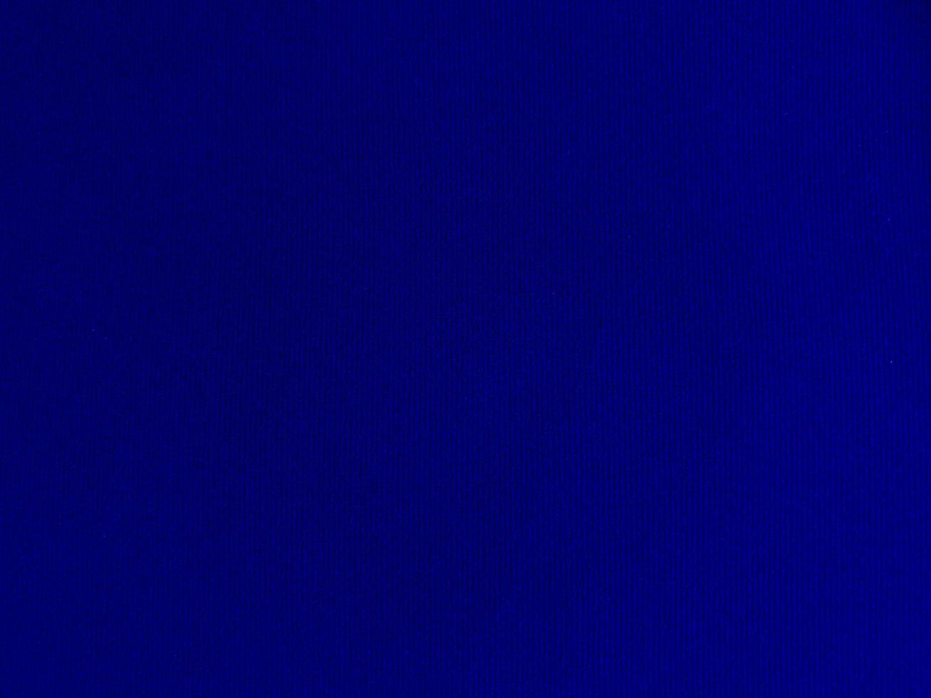Blue velvet fabric texture used as background. Empty blue fabric background of soft and smooth textile material. There is space for text. photo