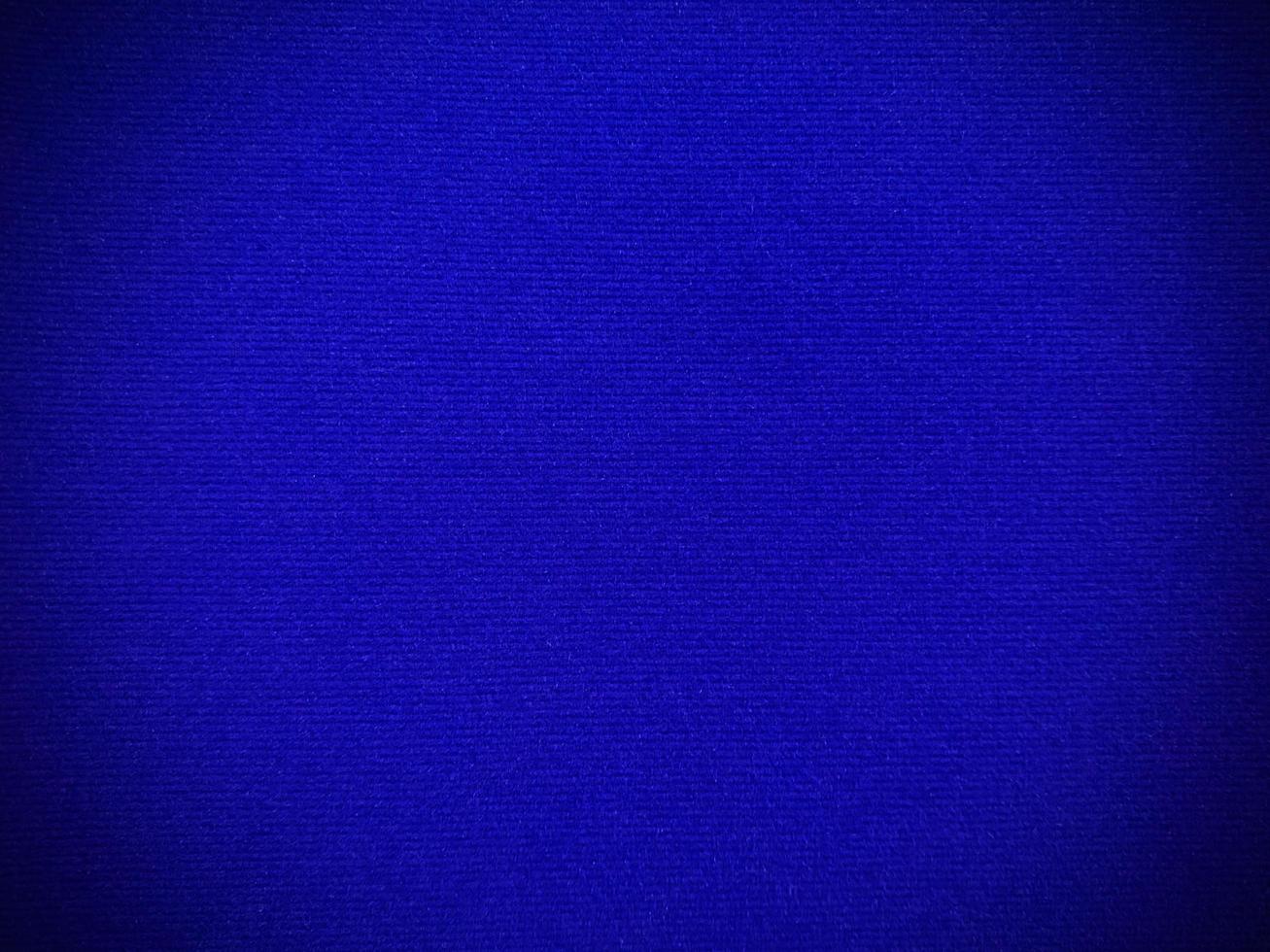 Blue velvet fabric texture used as background. Empty blue fabric background of soft and smooth textile material. There is space for text. photo