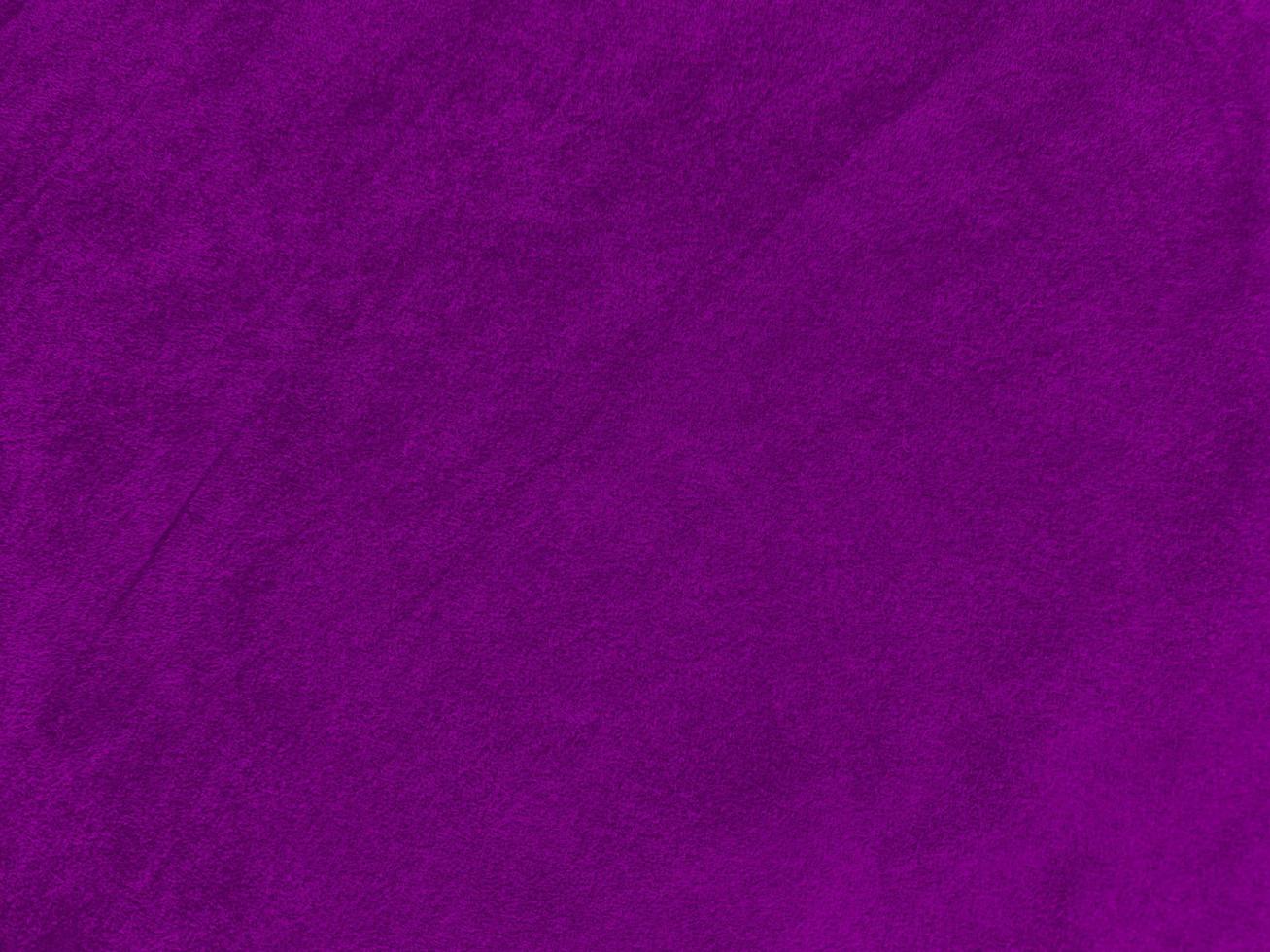 Purple velvet fabric texture used as background. Empty purple fabric background of soft and smooth textile material. There is space for text. photo