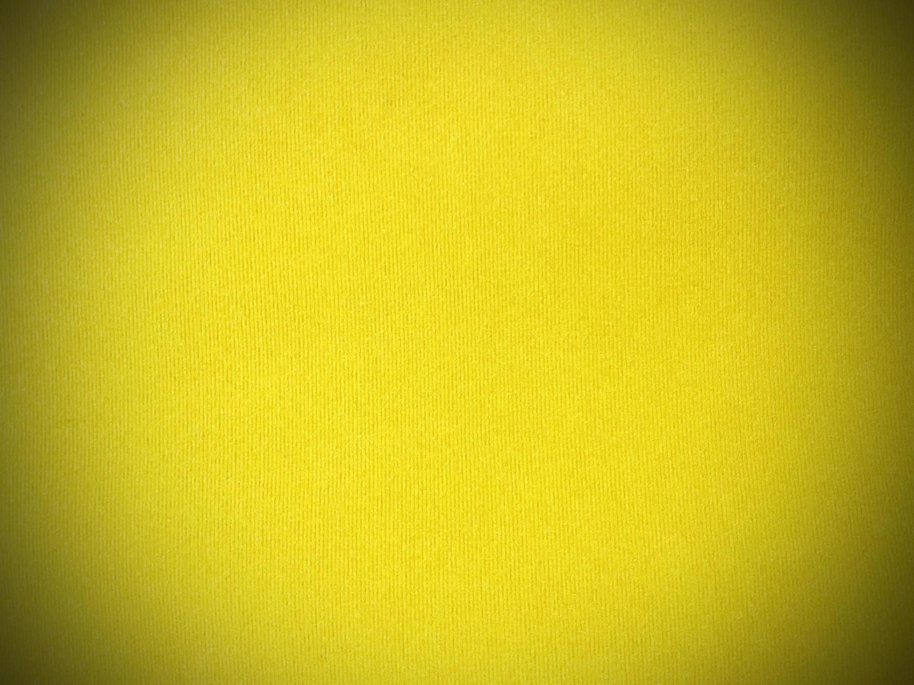 Pastel yellow velvet fabric texture used as background. Empty yellow fabric background of soft and smooth textile material. There is space for text. photo