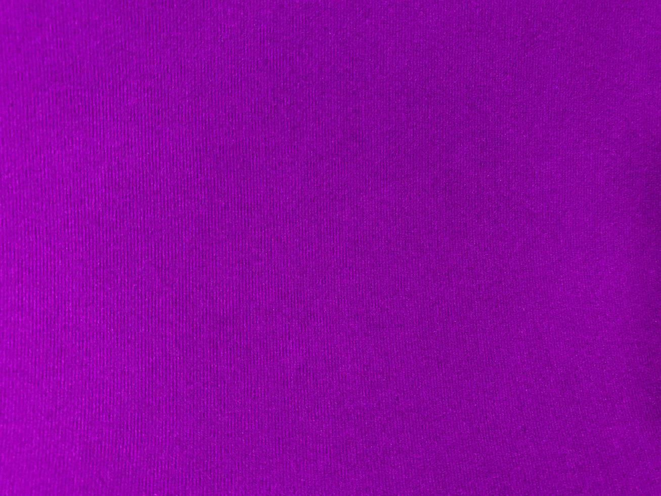 Purple velvet fabric texture used as background. Empty purple fabric background of soft and smooth textile material. There is space for text. photo