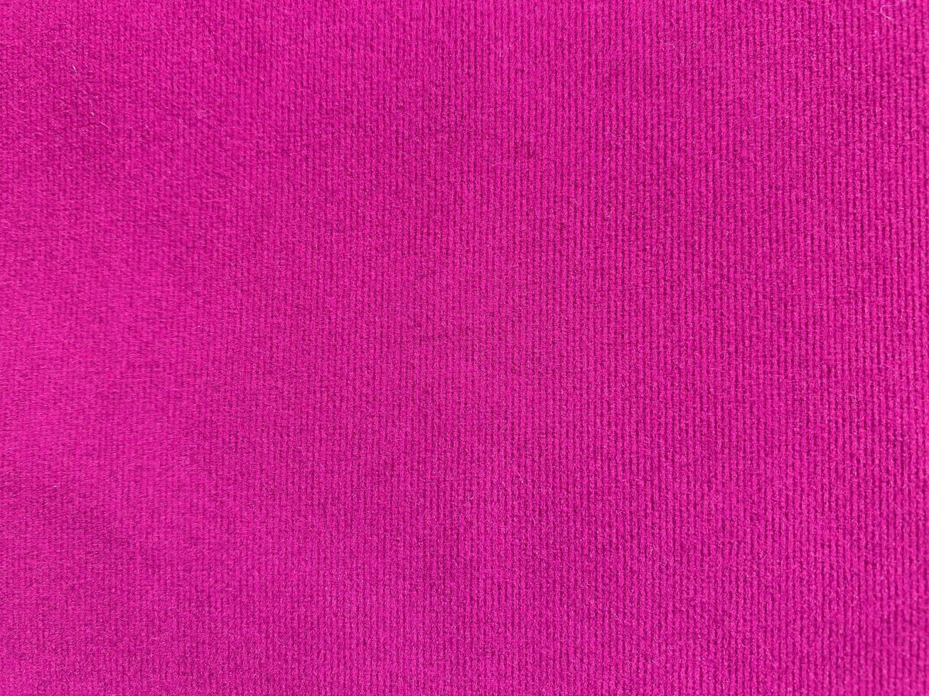 Pink velvet fabric texture used as background. Empty pink fabric background of soft and smooth textile material. There is space for text. photo