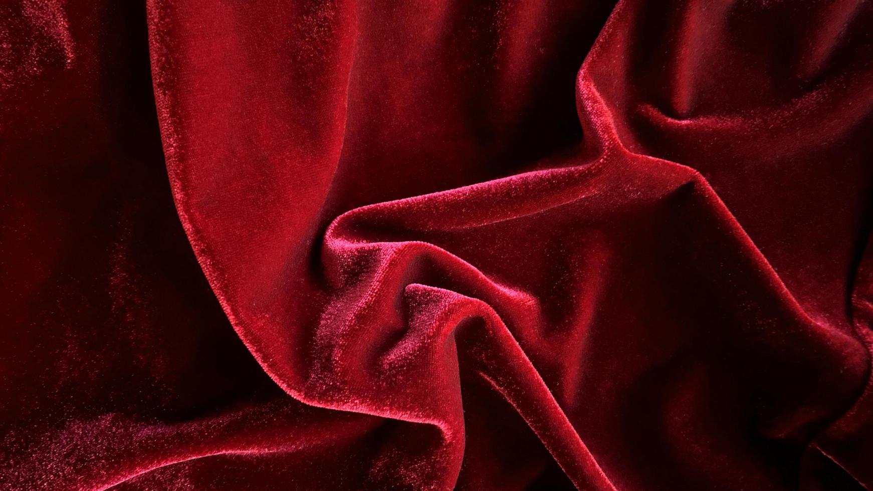 Red velvet fabric texture used as background. Empty red fabric background of soft and smooth textile material. There is space for text. photo