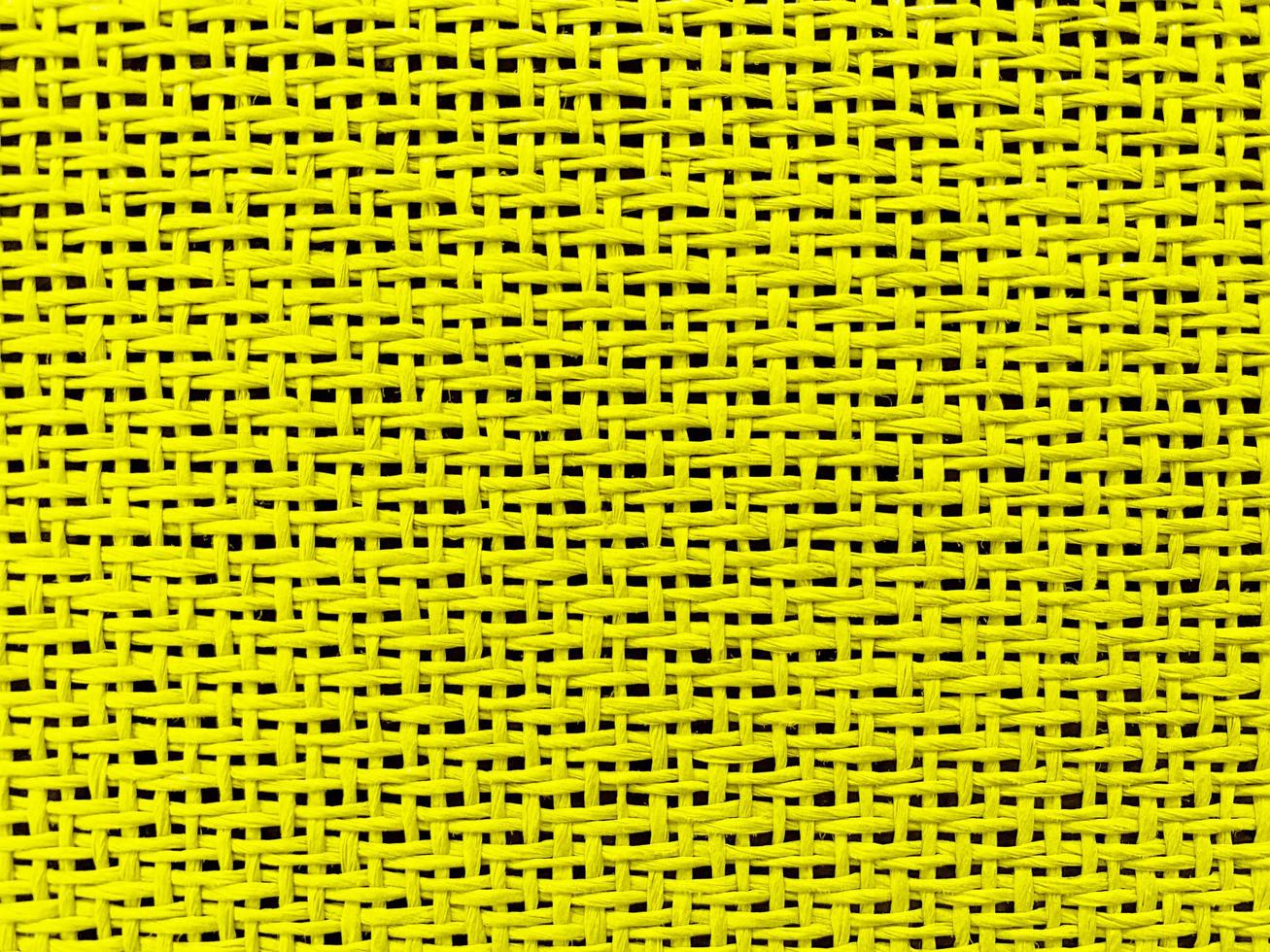 Close up yellow The  is woven into a net. natura rope texture as a background. Full frame of tightly woven rope pattern.with space for text, for a background. photo