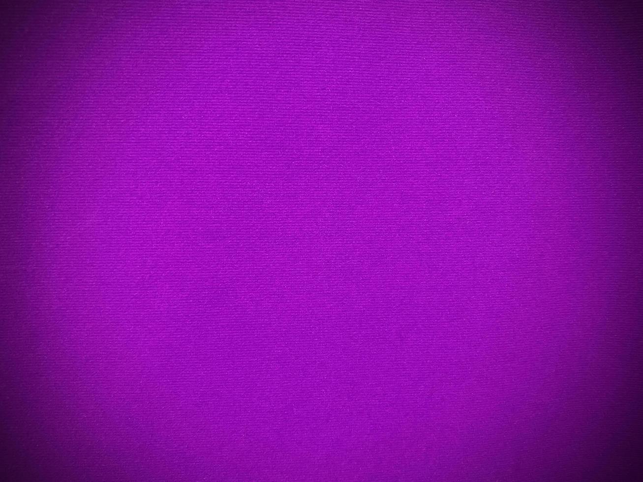 Dark purple old velvet fabric texture used as background. Empty purple fabric background of soft and smooth textile material. There is space for text.... photo