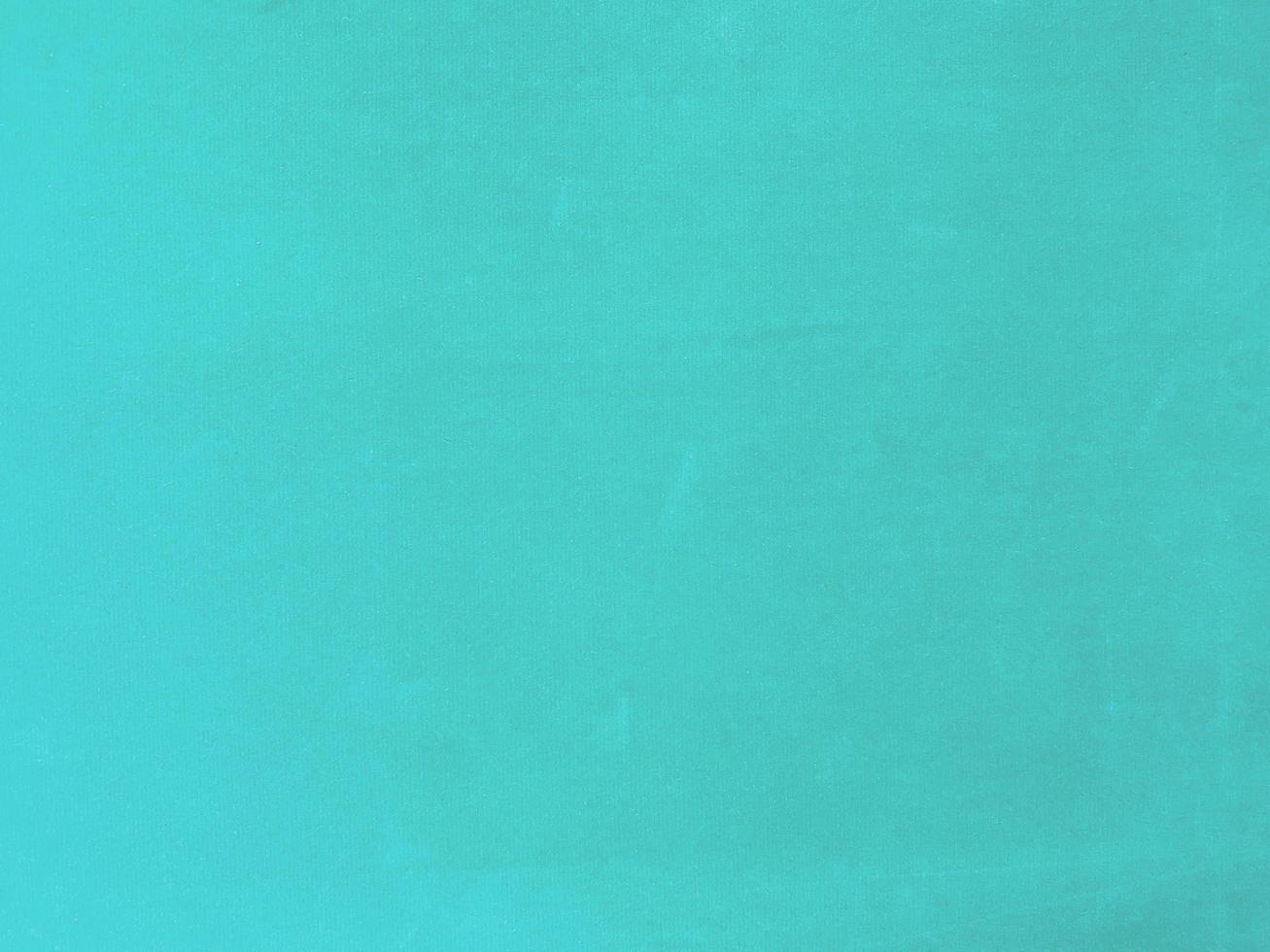 turquoise velvet fabric texture used as background. Empty turquoise fabric background of soft and smooth textile material. There is space for text. photo