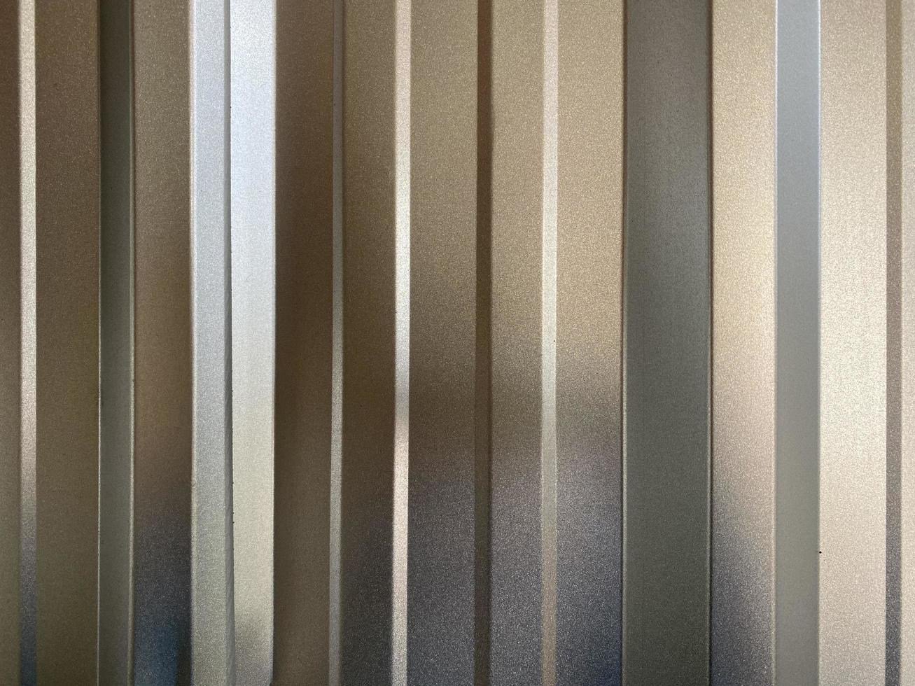 light metal surface, stainless steel plate with a longitudinal pattern.surface, Rough texture, use for a background. Macro image. Concept of a seamless. photo
