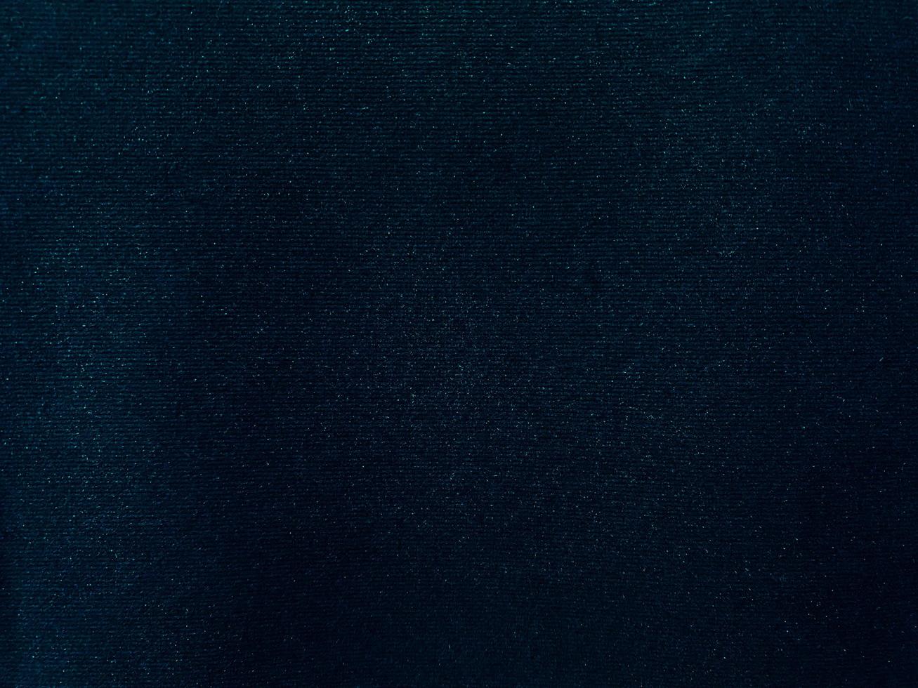 Blue velvet fabric texture used as background. Empty blue fabric background of soft and smooth textile material. There is space for text. photo