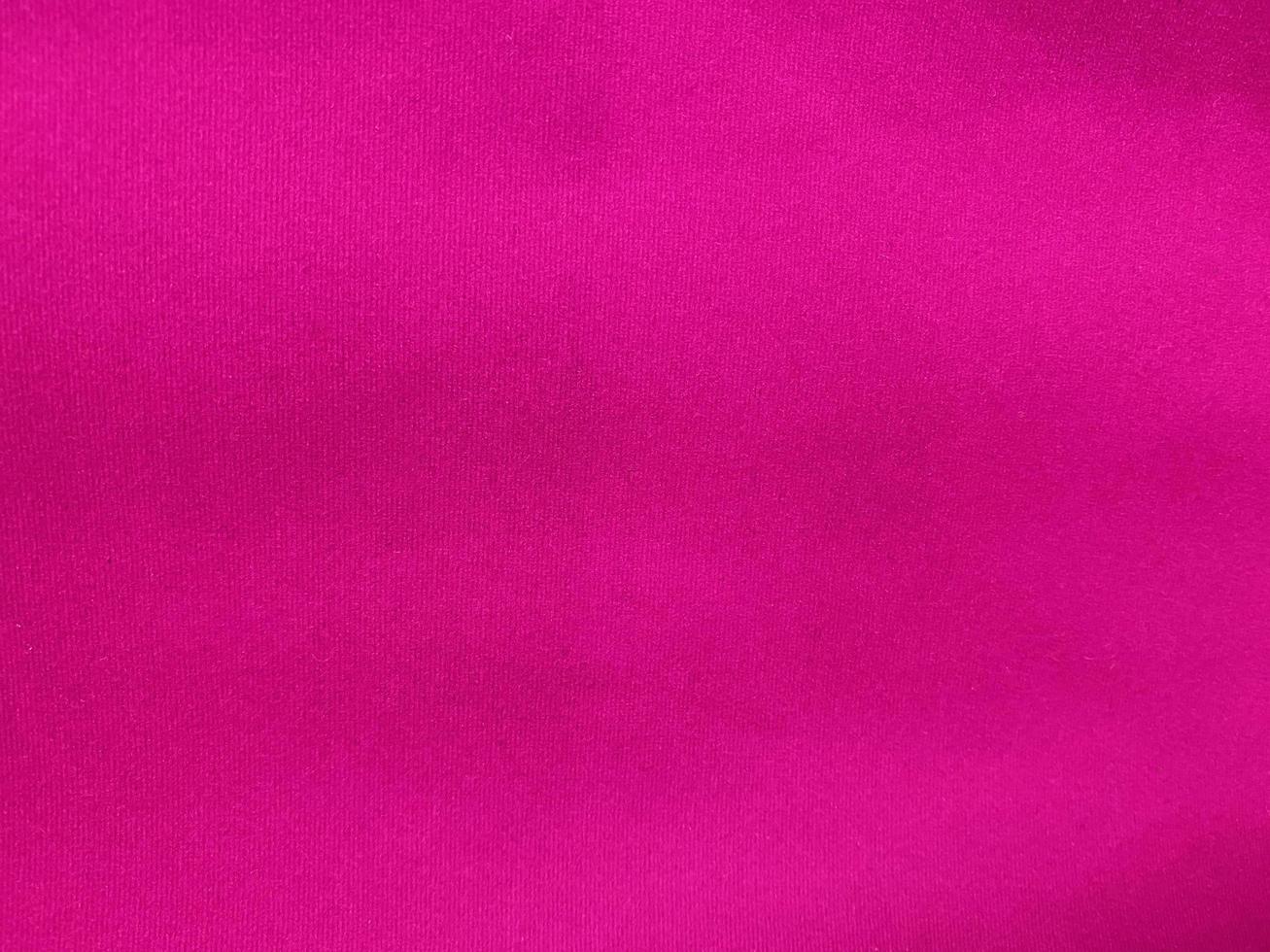 Pink velvet fabric texture used as background. Empty pink  fabric background of soft and smooth textile material. There is space for text. photo