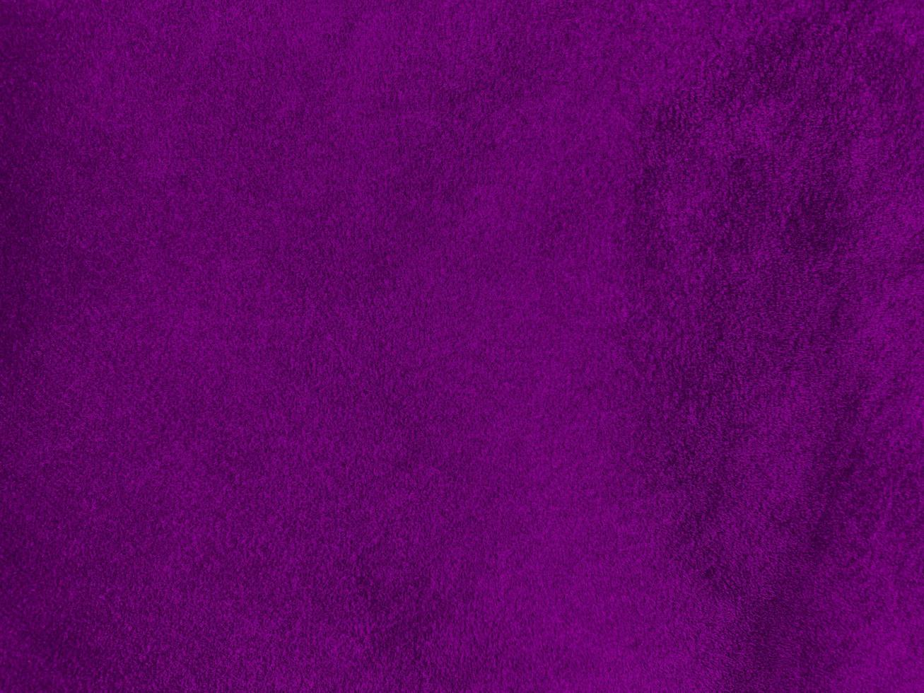 Purple velvet fabric texture used as background. Empty purple fabric background of soft and smooth textile material. There is space for text. photo