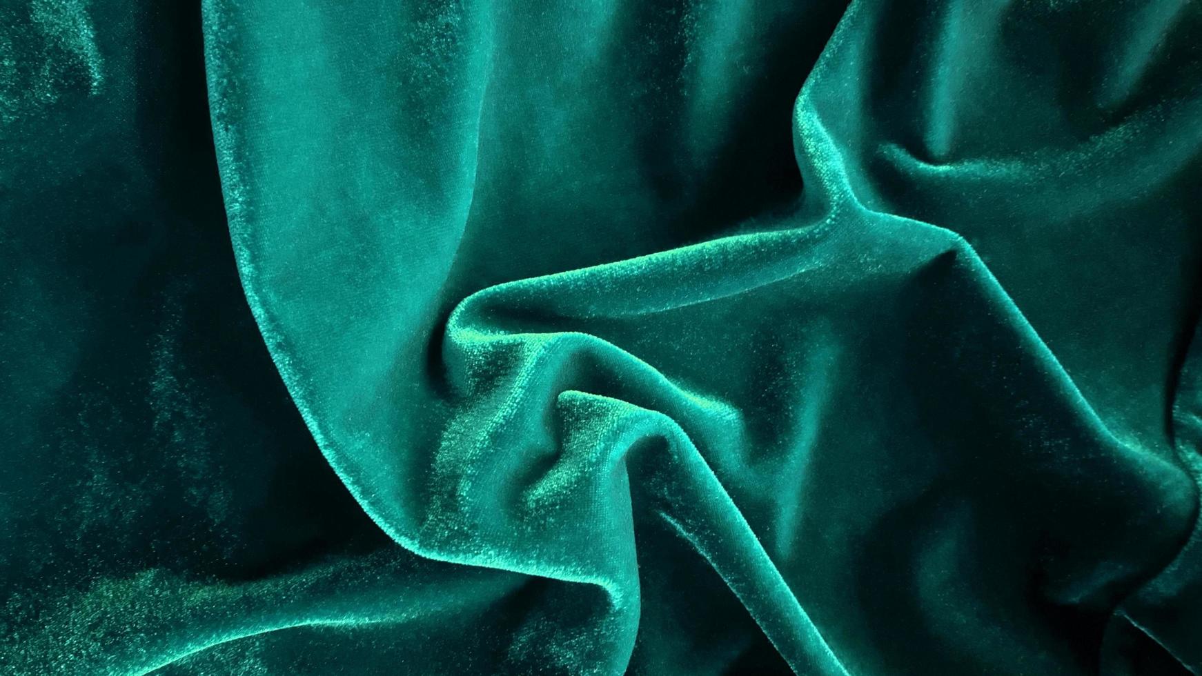 ocean color velvet fabric texture used as background. Empty ocean colorfabric background of soft and smooth textile material. There is space for text. photo