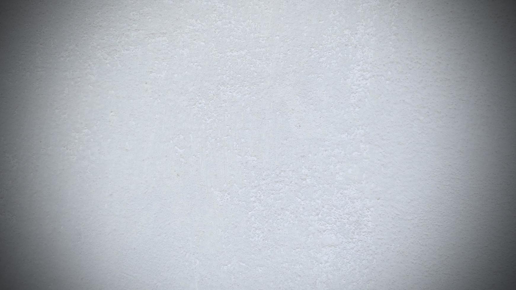 Seamless texture of white cement wall a rough surface, with space for text, for a background. Ready to use vignette. photo