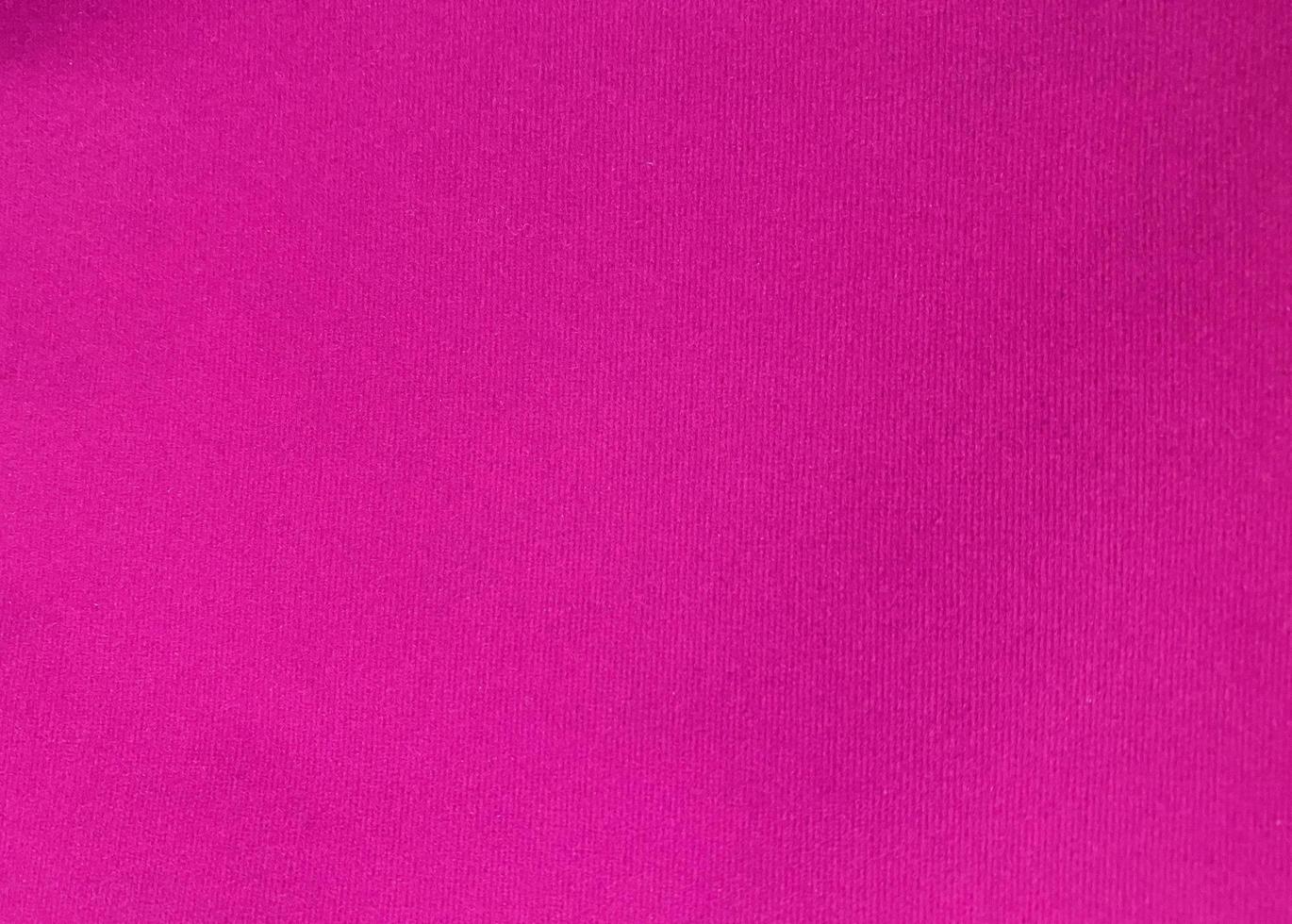 Pink velvet fabric texture used as background. Empty pink fabric background of soft and smooth textile material. There is space for text. photo