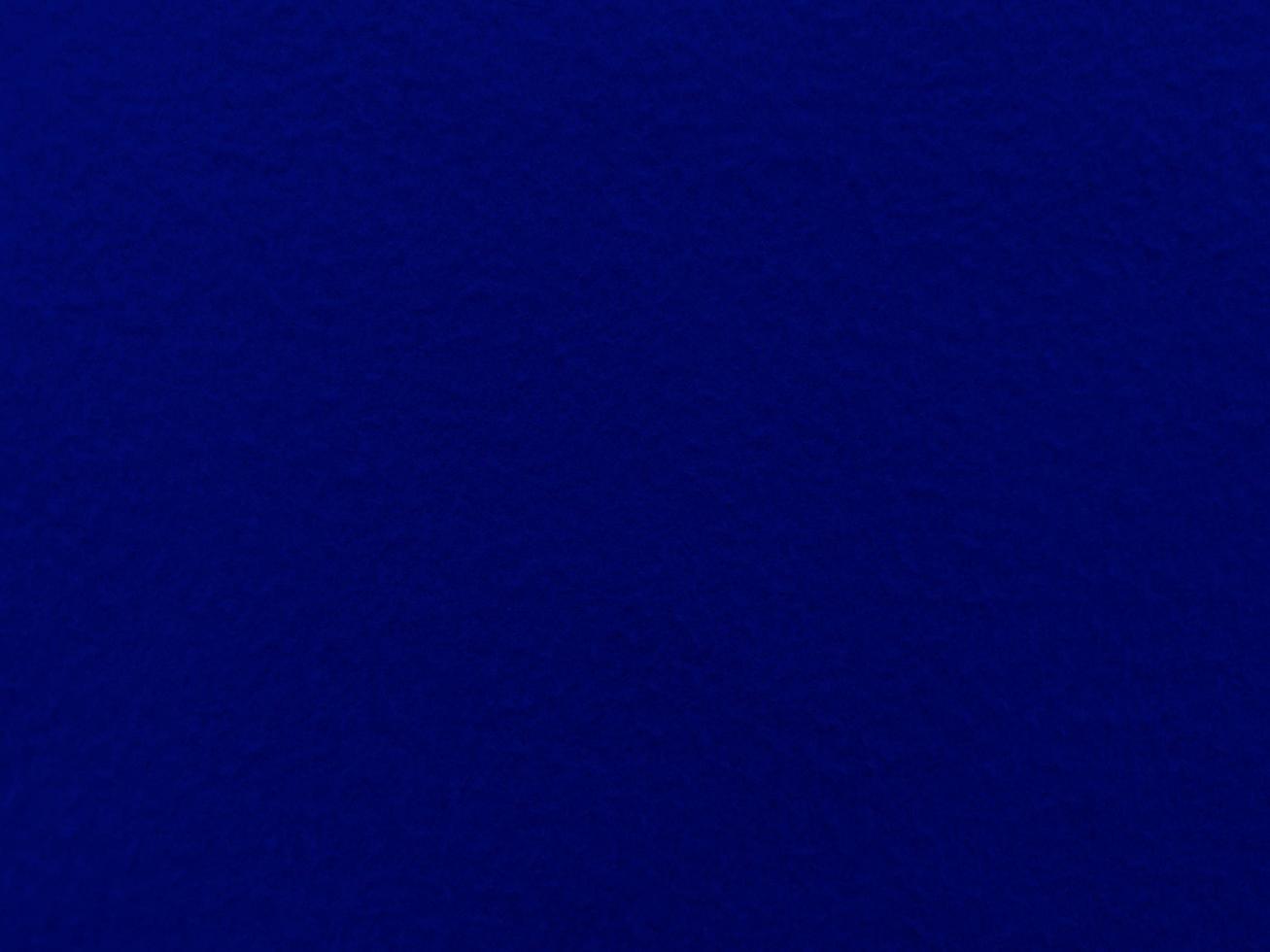Felt blue  soft rough textile material background texture close up,poker table,tennis ball,table cloth. Empty blue fabric background. photo